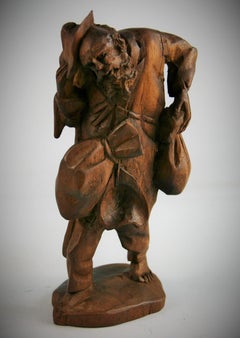 Black Forest Hand Carved Walnut Figural Traveler Sculpture