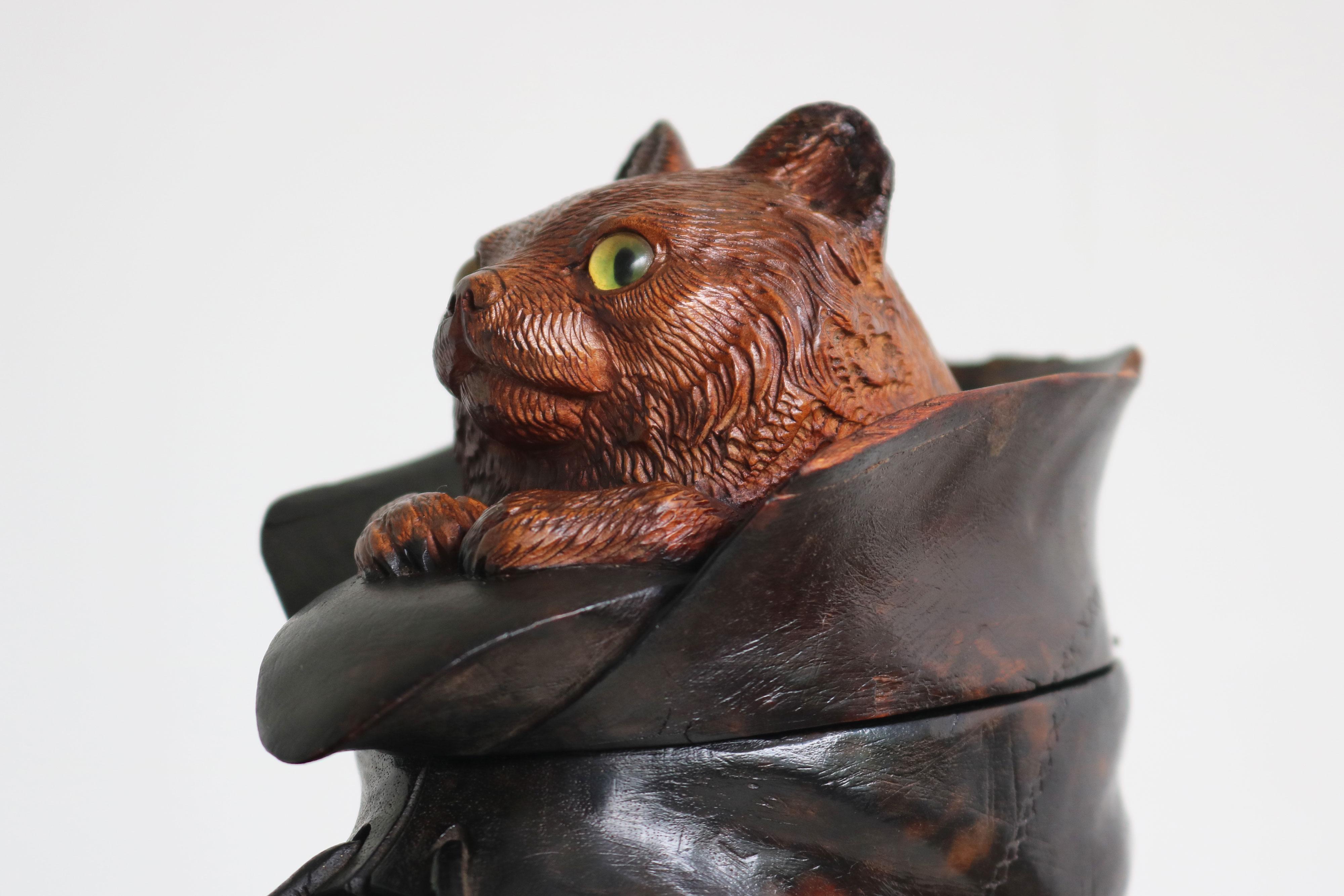 Gorgeous most rare Swiss Black Forest 19th century Inkwell / desk accessory fully hand carved displaying a cat in a boot.
The cat is very detailed with glass eyes (slight damage to back edge of the boot see pictures) 
Detailed carving by a master