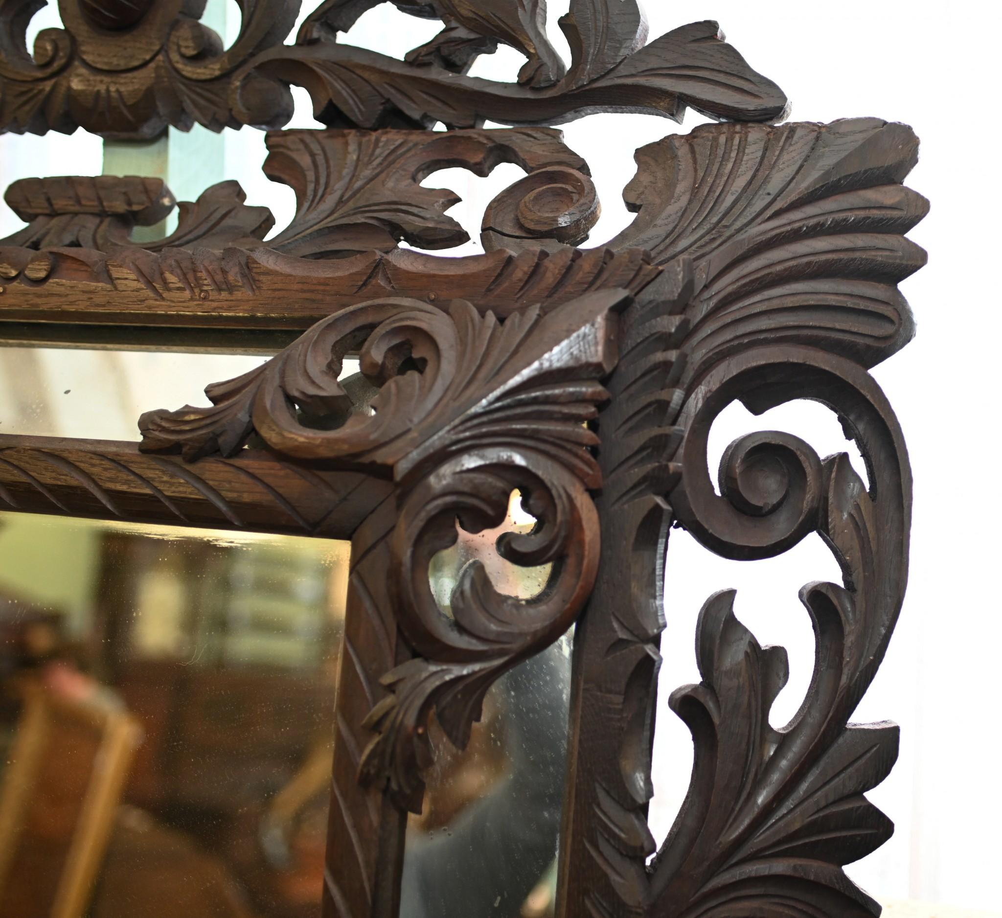 Elegant German Black Forest mirror
Glass is clear and blemish free, perfect for modern interiors
Intricately carved frame with floral motifs and lions to the top
Great for a rustic lodge / ski chalet vibe
Offered in great condition ready for home