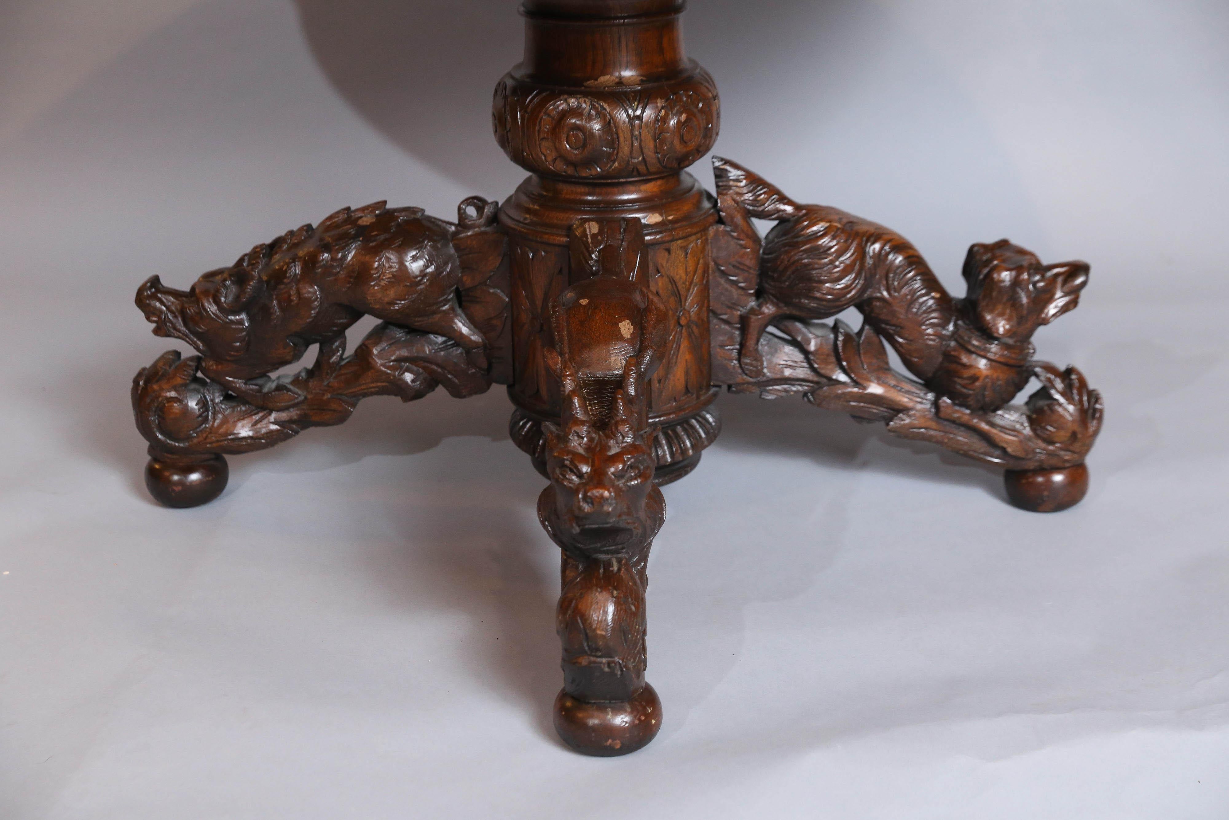 Austrian Black Forest Oak and Walnut Oval Centre Table with Carved Animals For Sale