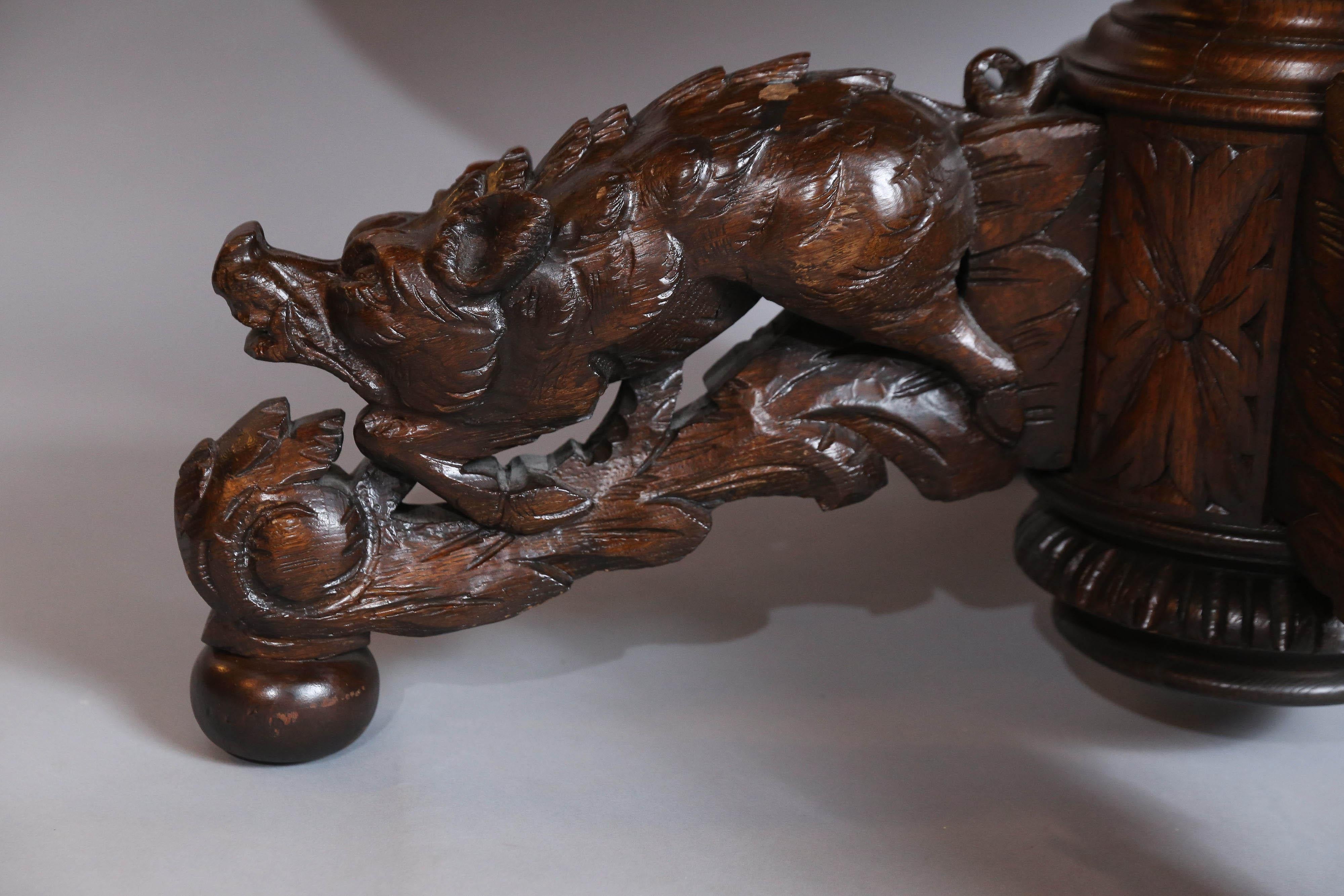 19th Century Black Forest Oak and Walnut Oval Centre Table with Carved Animals For Sale