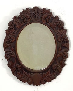 Black Forest Oval Beveled Mirror with Hand Carved Frame (H 25 1/2 x W 20 1/2)