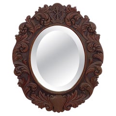 Black Forest Oval Beveled Mirror with Hand Carved Frame (H 25 1/2 x W 20 1/2)