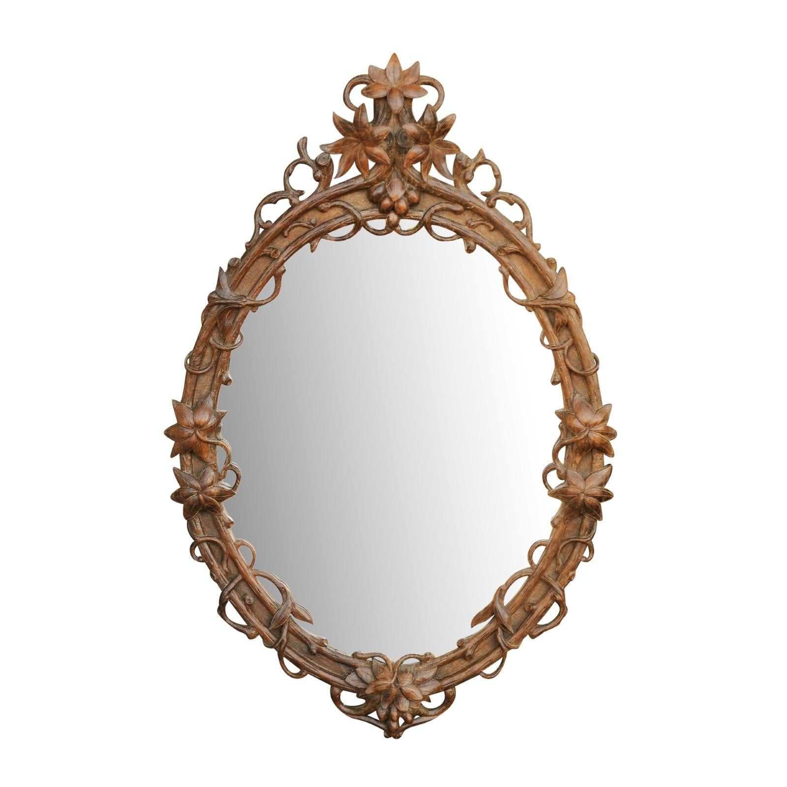Black Forest Oval Oak Mirror with Hand Carved Edelweiss Flowers, circa 1900