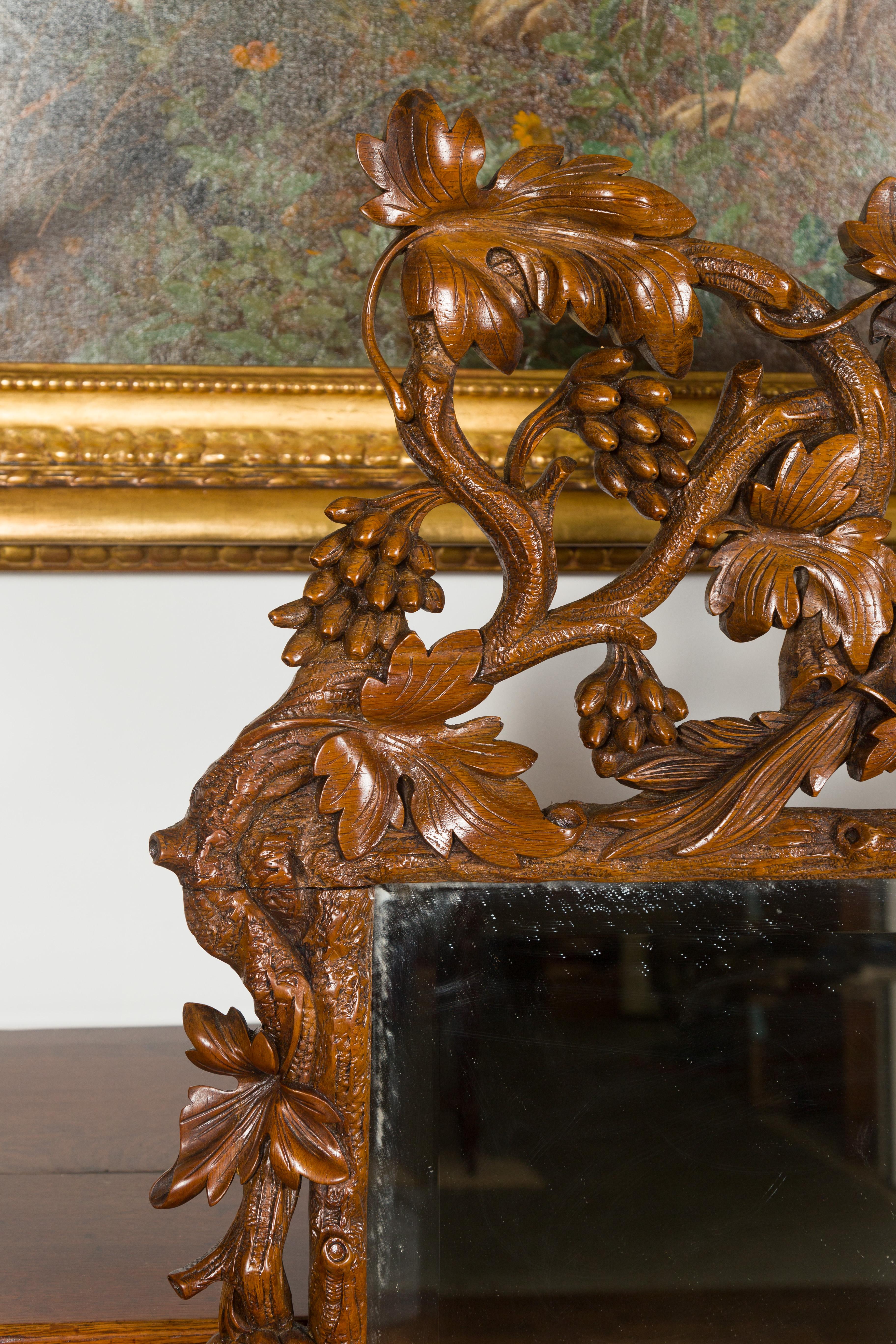 20th Century Black Forest Period 1900s Wooden Mirror with Carved Dog, Foliage and Fruits