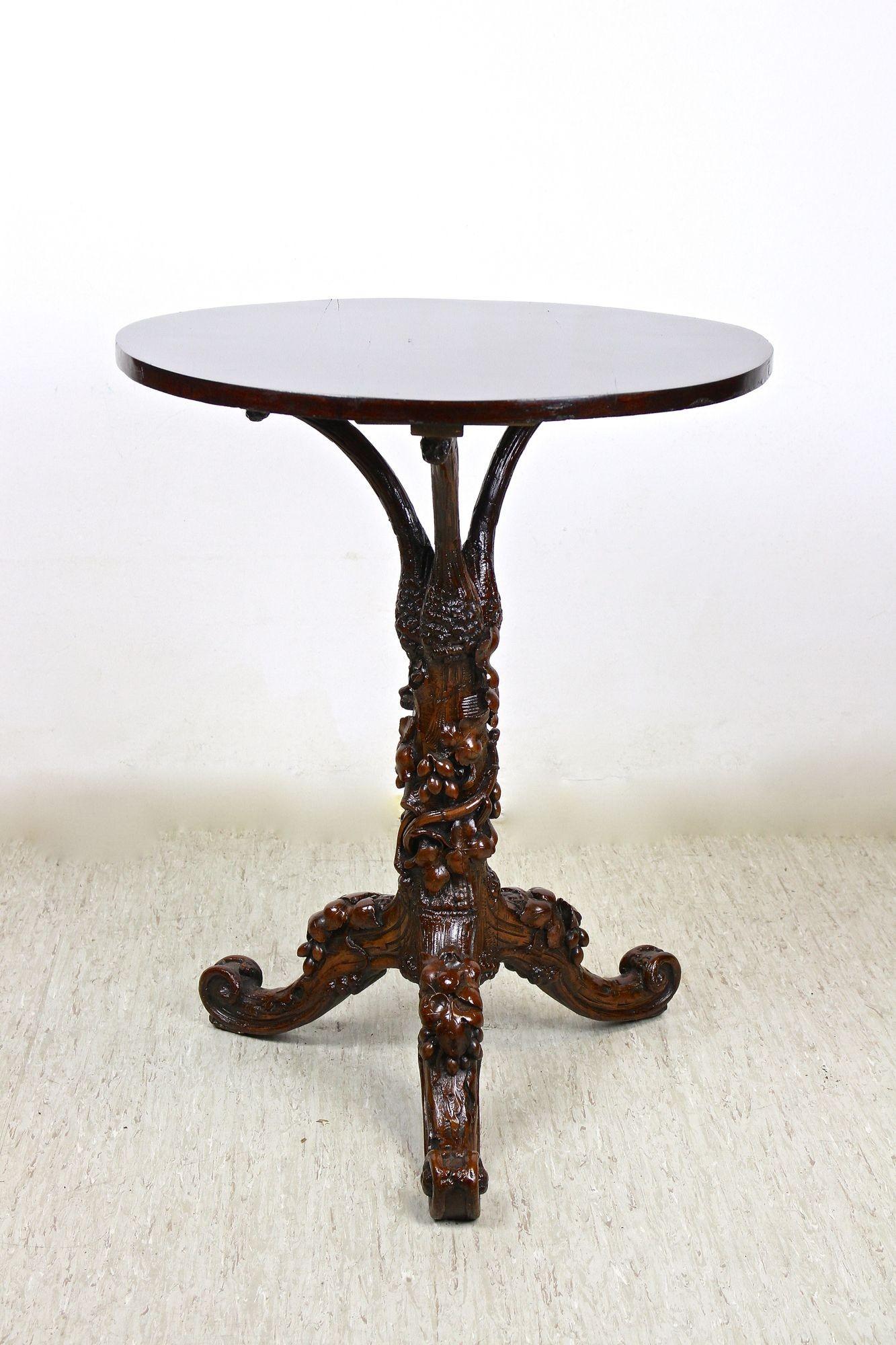 Austrian Black Forest Rustic Side Table with Handcarved Vine Theme, Austria, ca. 1880 For Sale