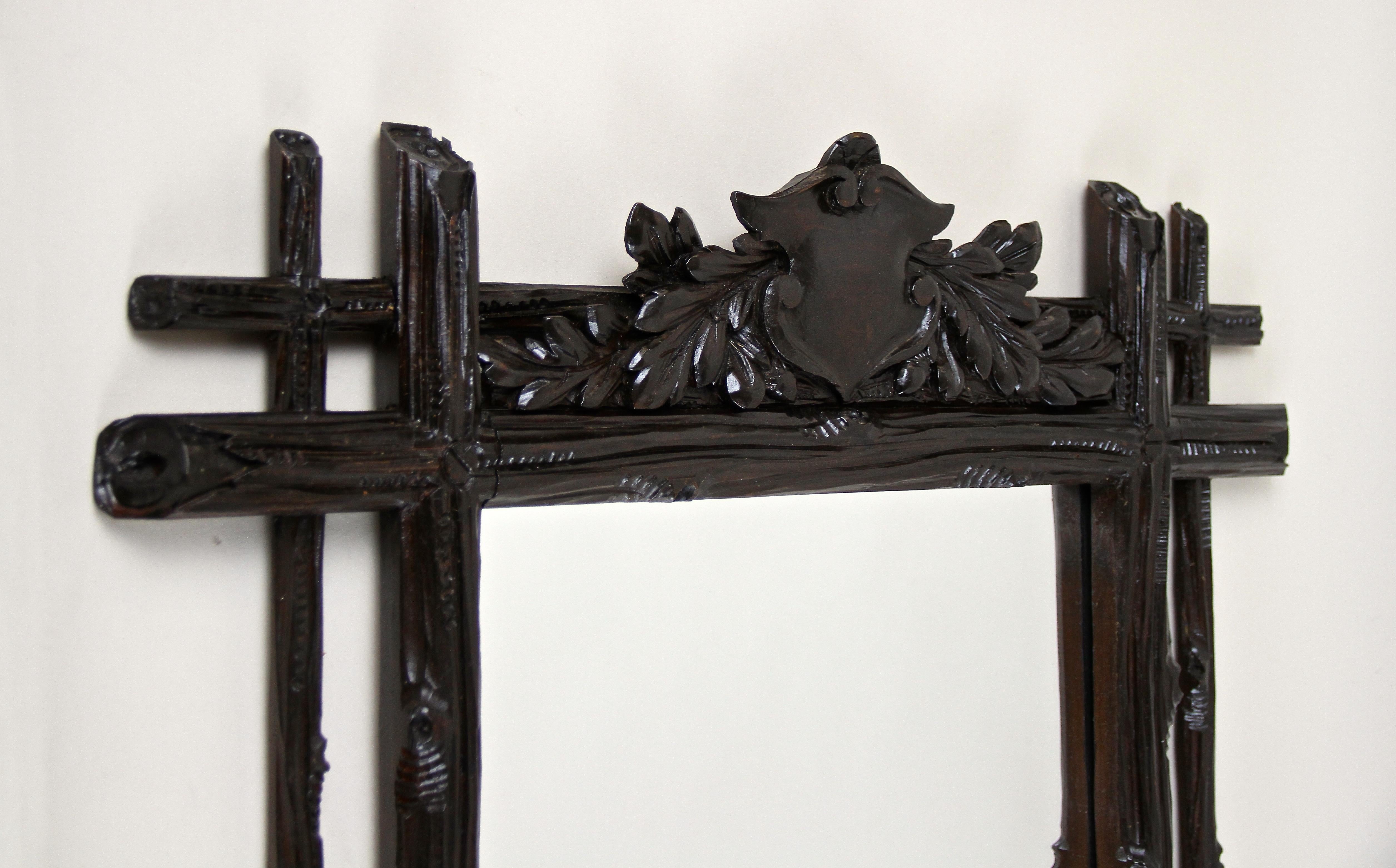 Austrian Black Forest Rustic Wall Mirror with Coat of Arms Carving, Austria, circa 1870 For Sale