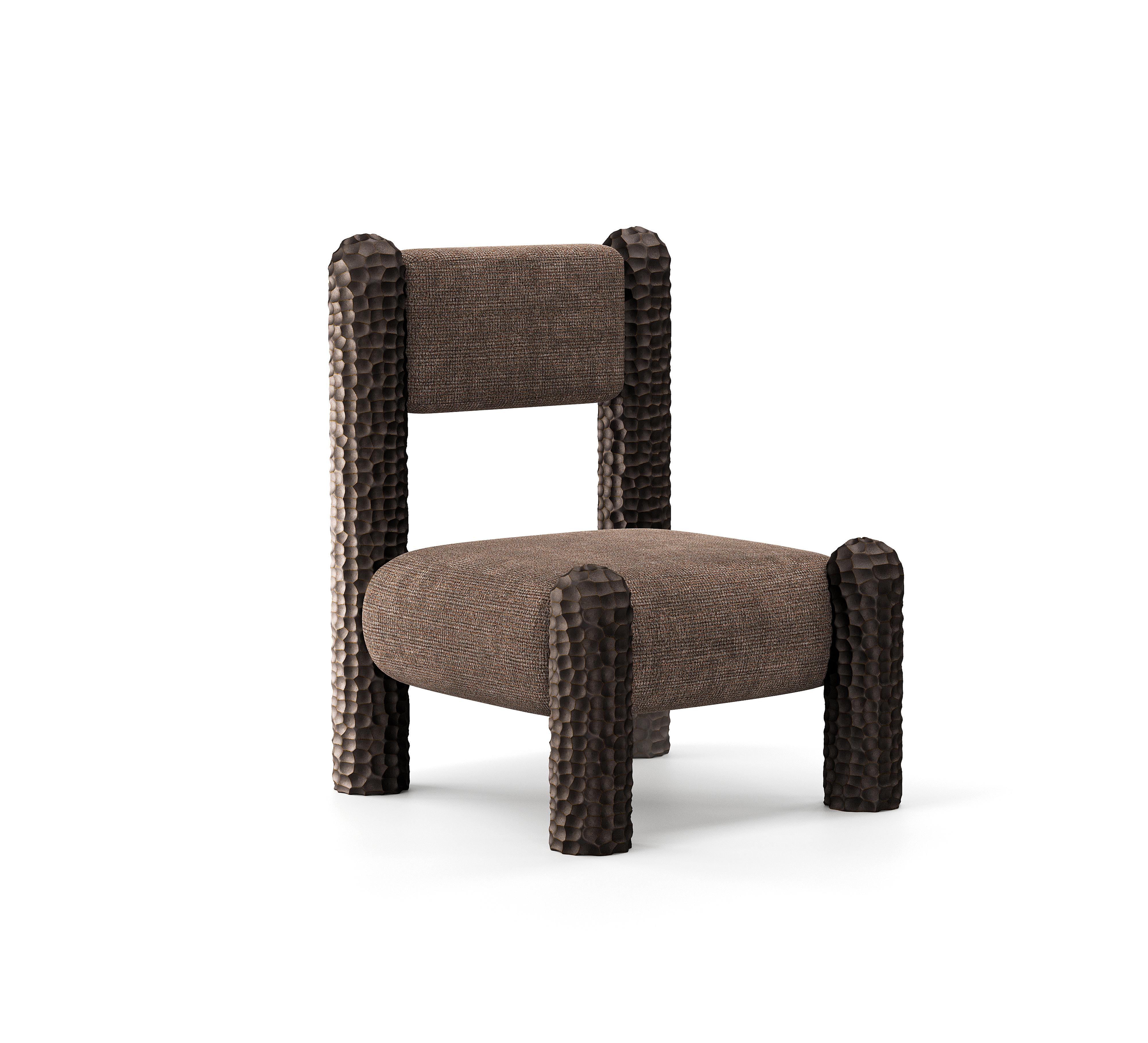 A sculptural statement piece rooted in nature, the Black Forest lounge chair is defined by its bold, hand-carved legs—monumental forms that evoke ancient tree trunks or forest columns. Designed as a tribute to the raw, untamed beauty of the natural