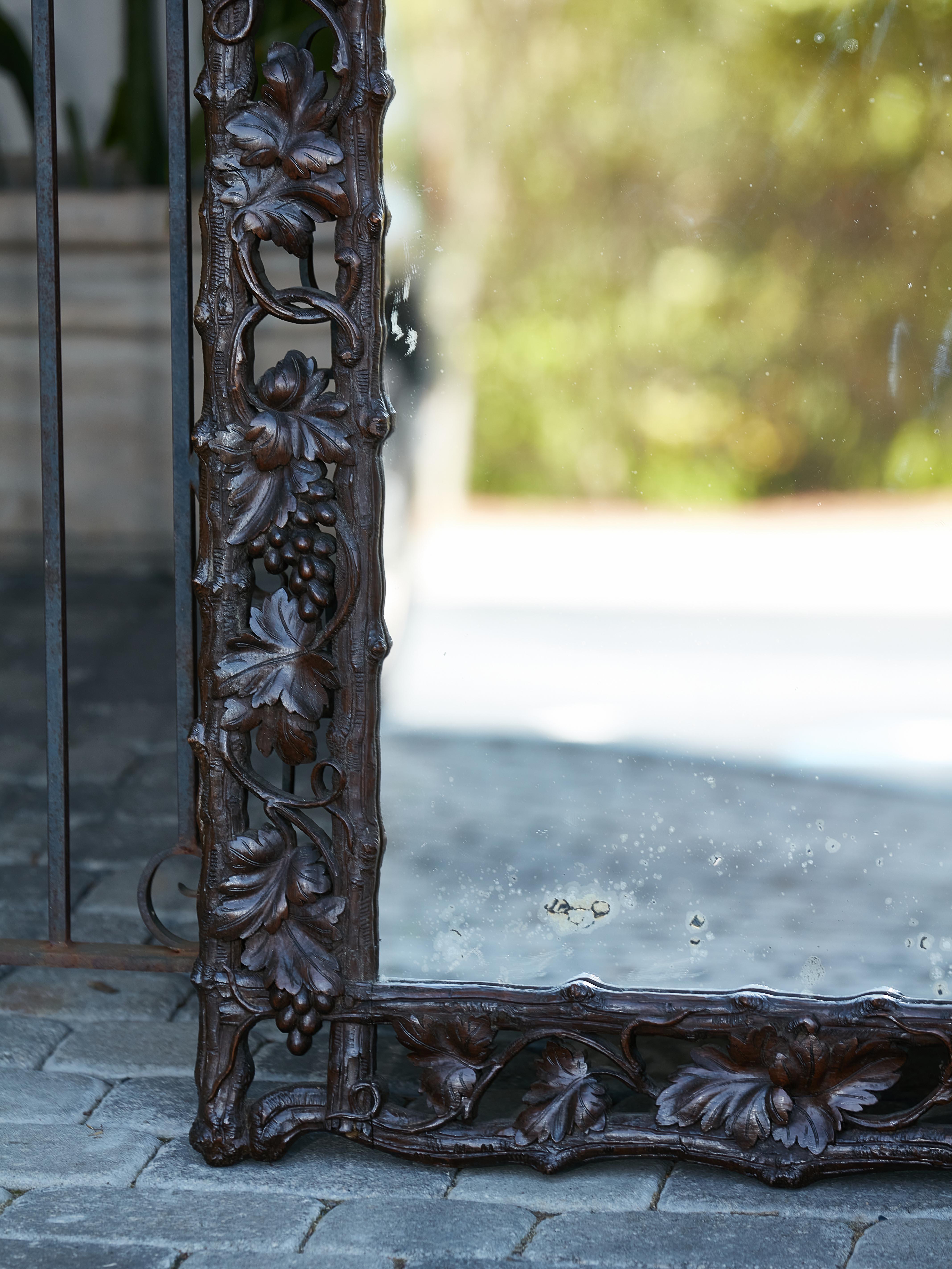 20th Century Black Forest Turn of the Century Carved Mirror with Grapevine Motifs, circa 1900 For Sale
