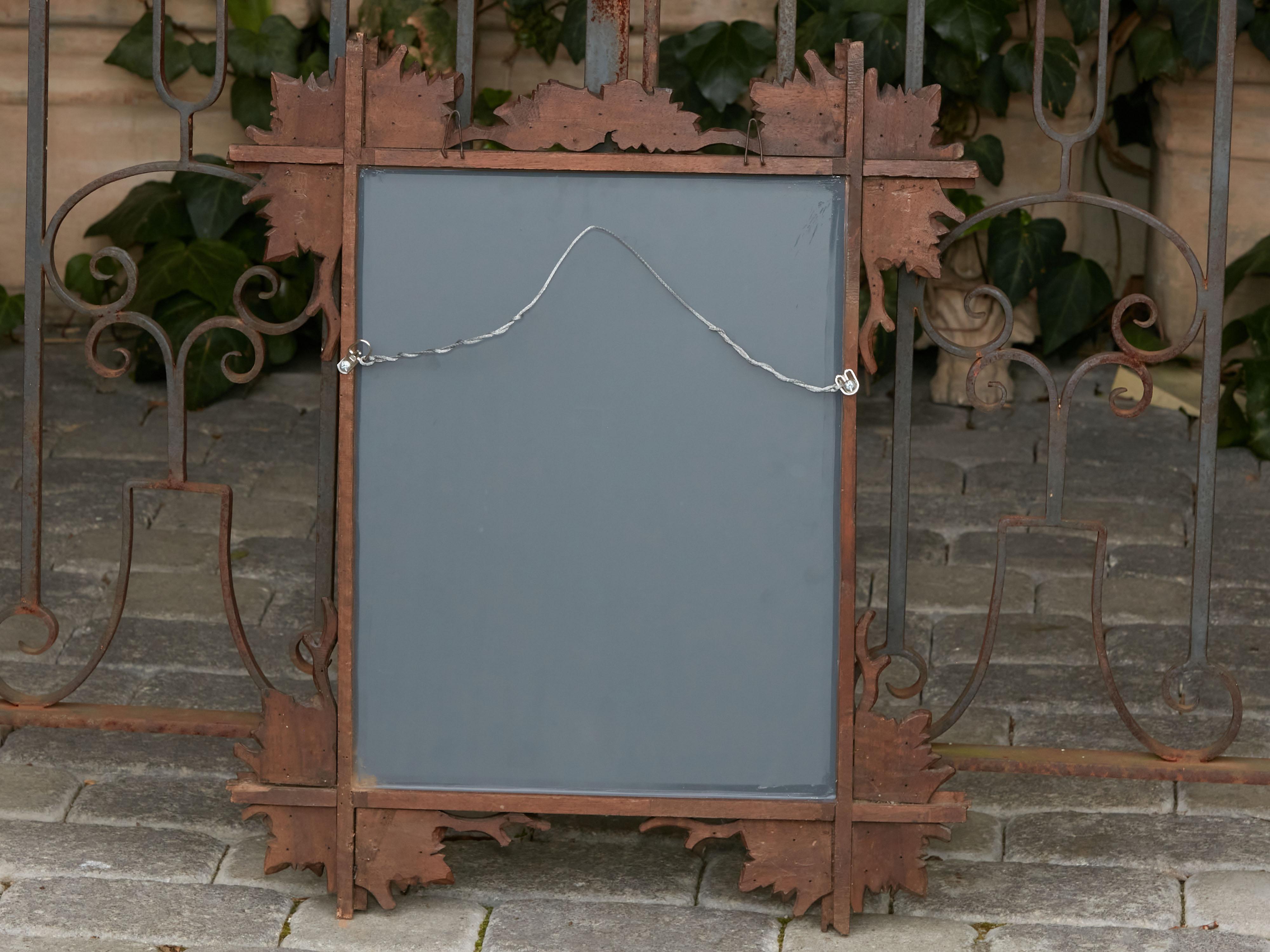 Black Forest Turn of the Century Mirror with Hand-Carved Oak Leaves and Viola 5