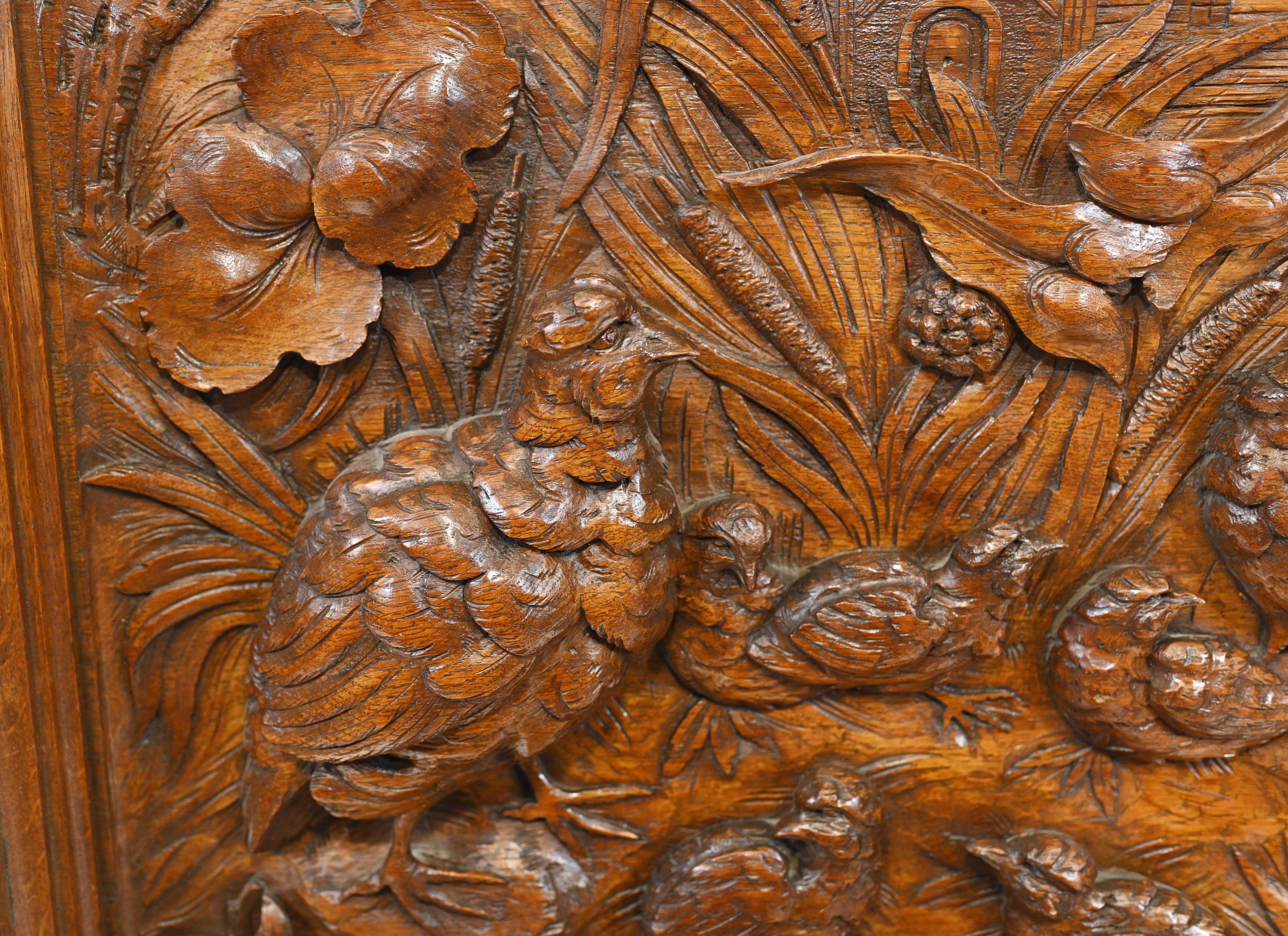 Highly collectable German Black Forest carved wall hanging
We date this sought after antique to circa 1840
An important Black Forest finely deep carved walnut wall decoration depicting game birds with their young 
The details and quality to the