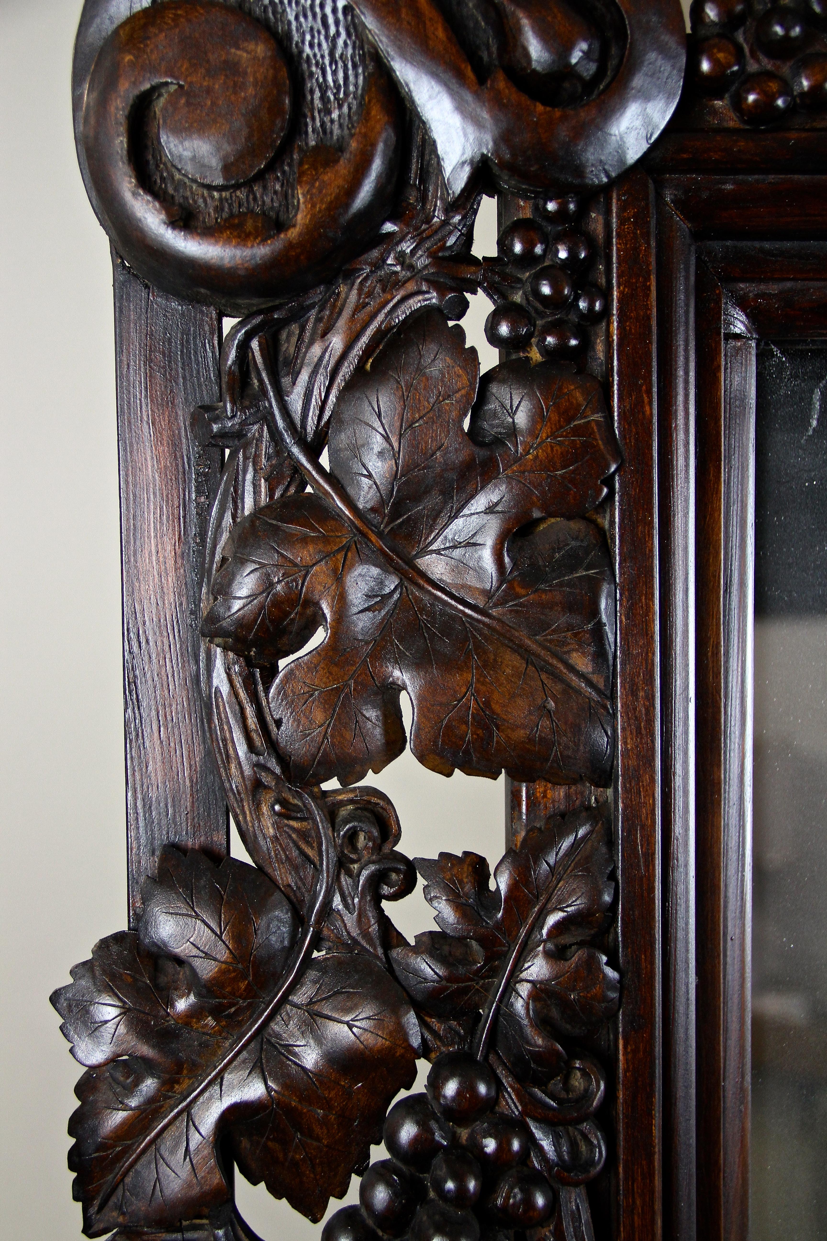 Austrian Black Forest Wall Mirror with Grapes and Leaves Hand Carved, Austria Dated 1919 For Sale