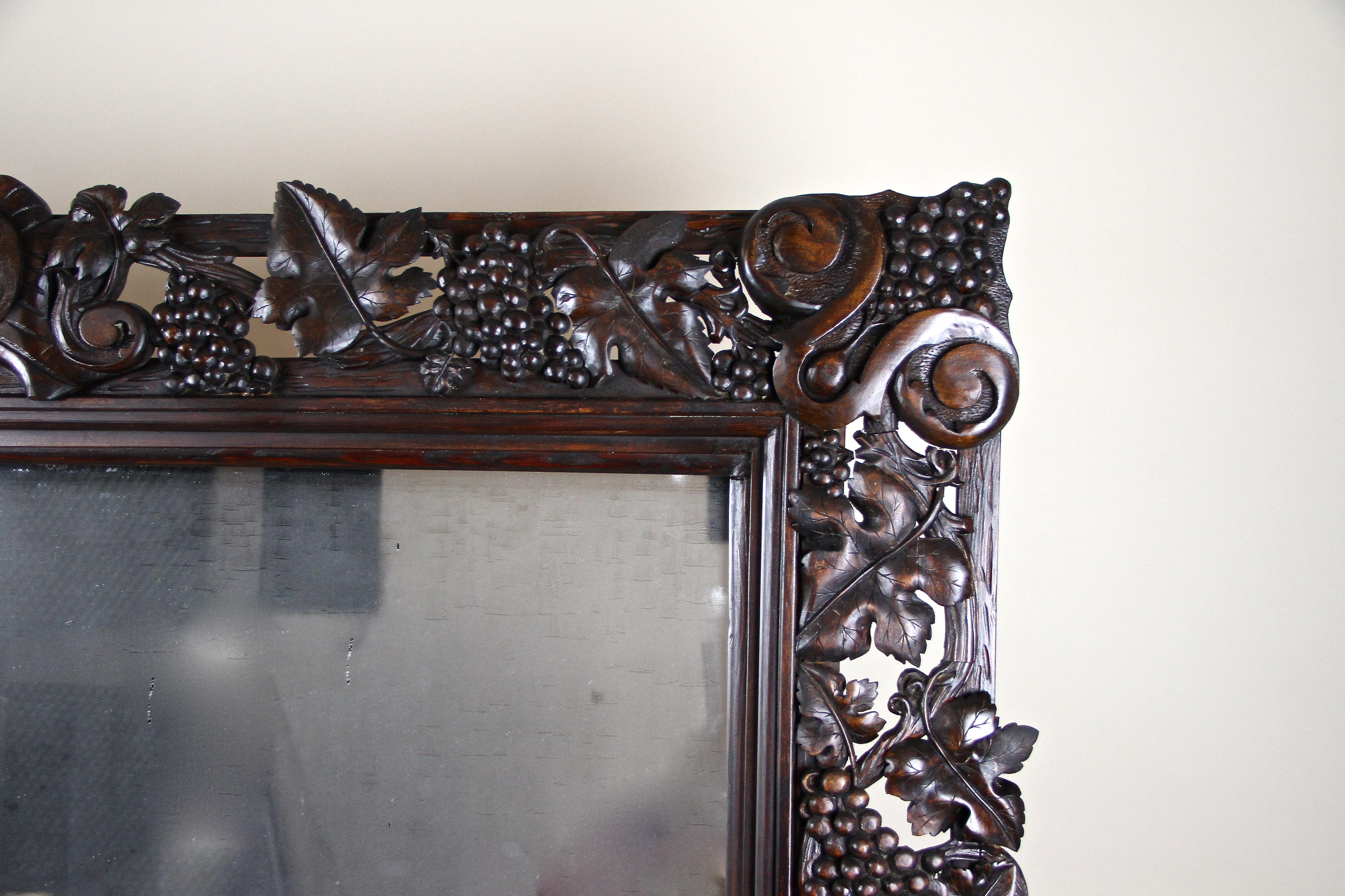 20th Century Black Forest Wall Mirror with Grapes and Leaves Hand Carved, Austria Dated 1919 For Sale