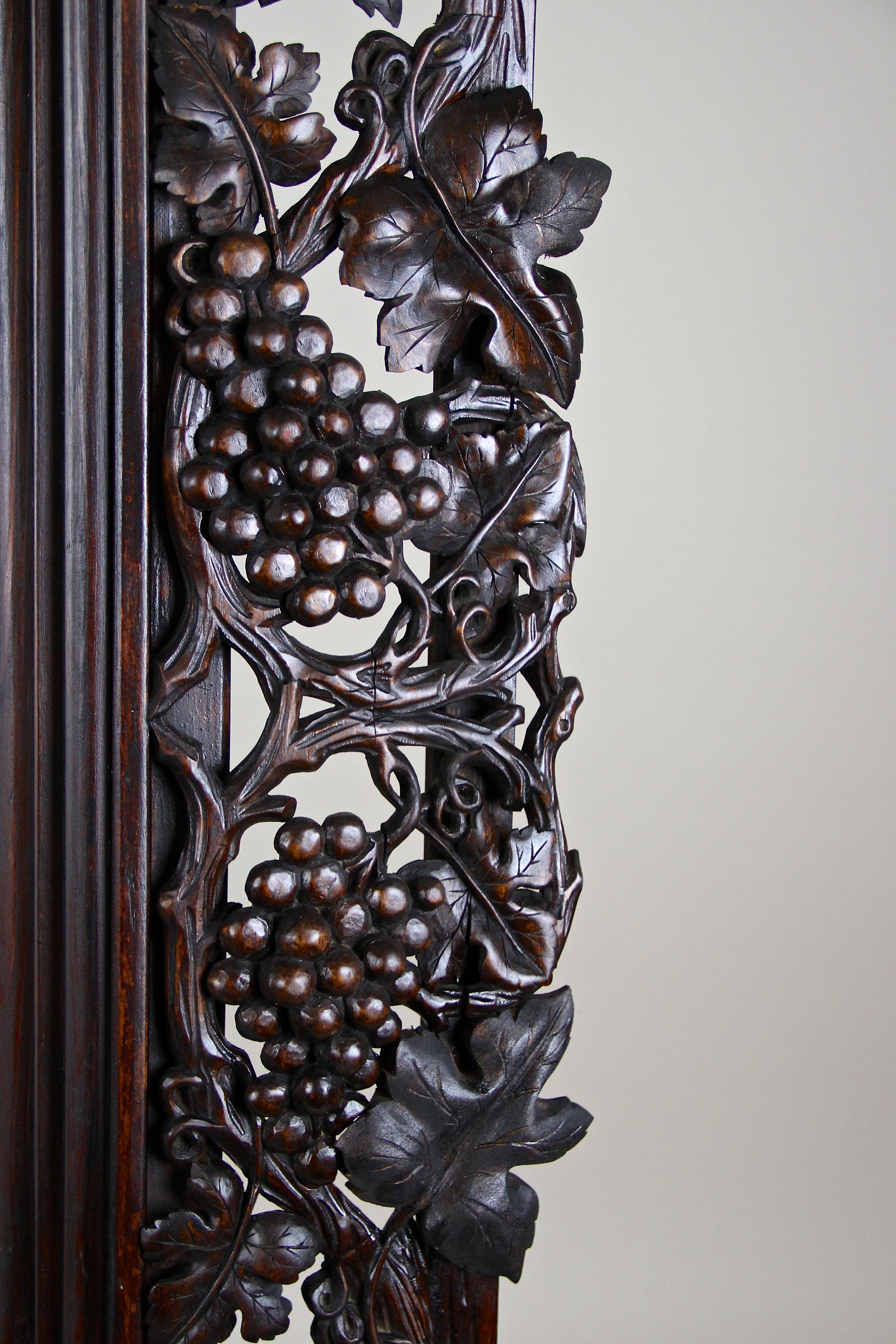 Spruce Black Forest Wall Mirror with Grapes and Leaves Hand Carved, Austria Dated 1919 For Sale