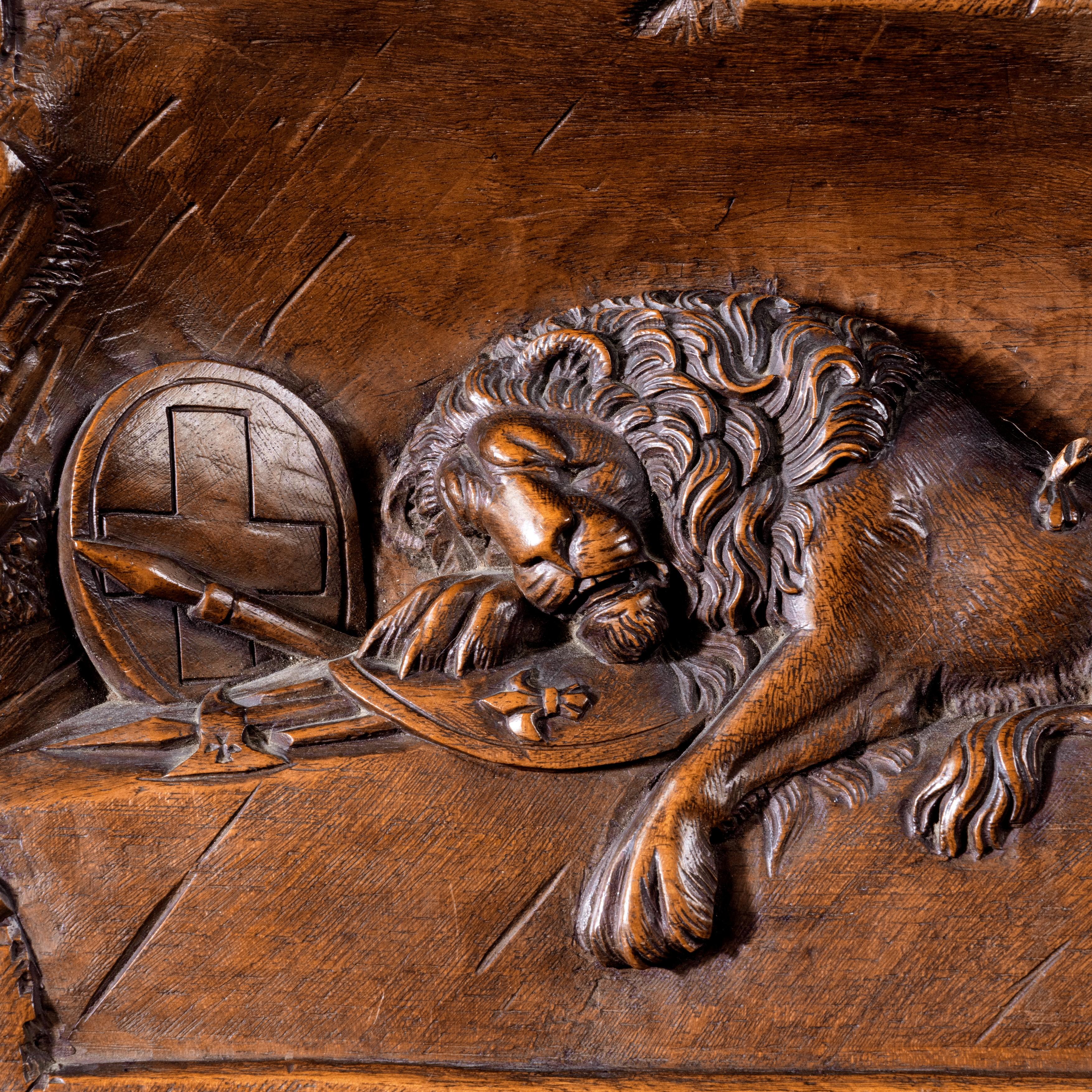 A ‘Black Forest’ walnut version of the Lion of Lucerne, the recumbent lion sleeping with his paws crossed. Swiss, circa 1890.


Footnote: For a drawing and a similar example see Arenski, Daniels and Daniels, ‘Swiss Carvings, The Art of the ‘Black