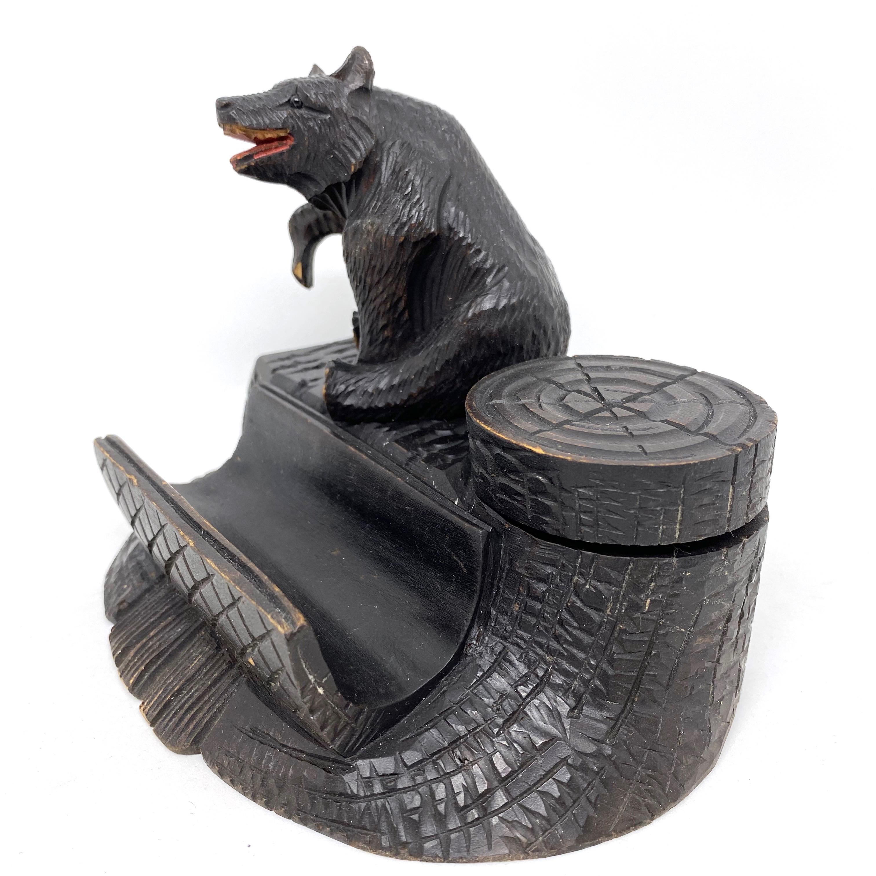 Classic 1890s black forest Brienz wood carved inkwell in form of a Bear. Nice addition to your room or just for use it on your desk. Made of hand carved wood and glass eyes. Found at an estate sale in Vienna, Austria.