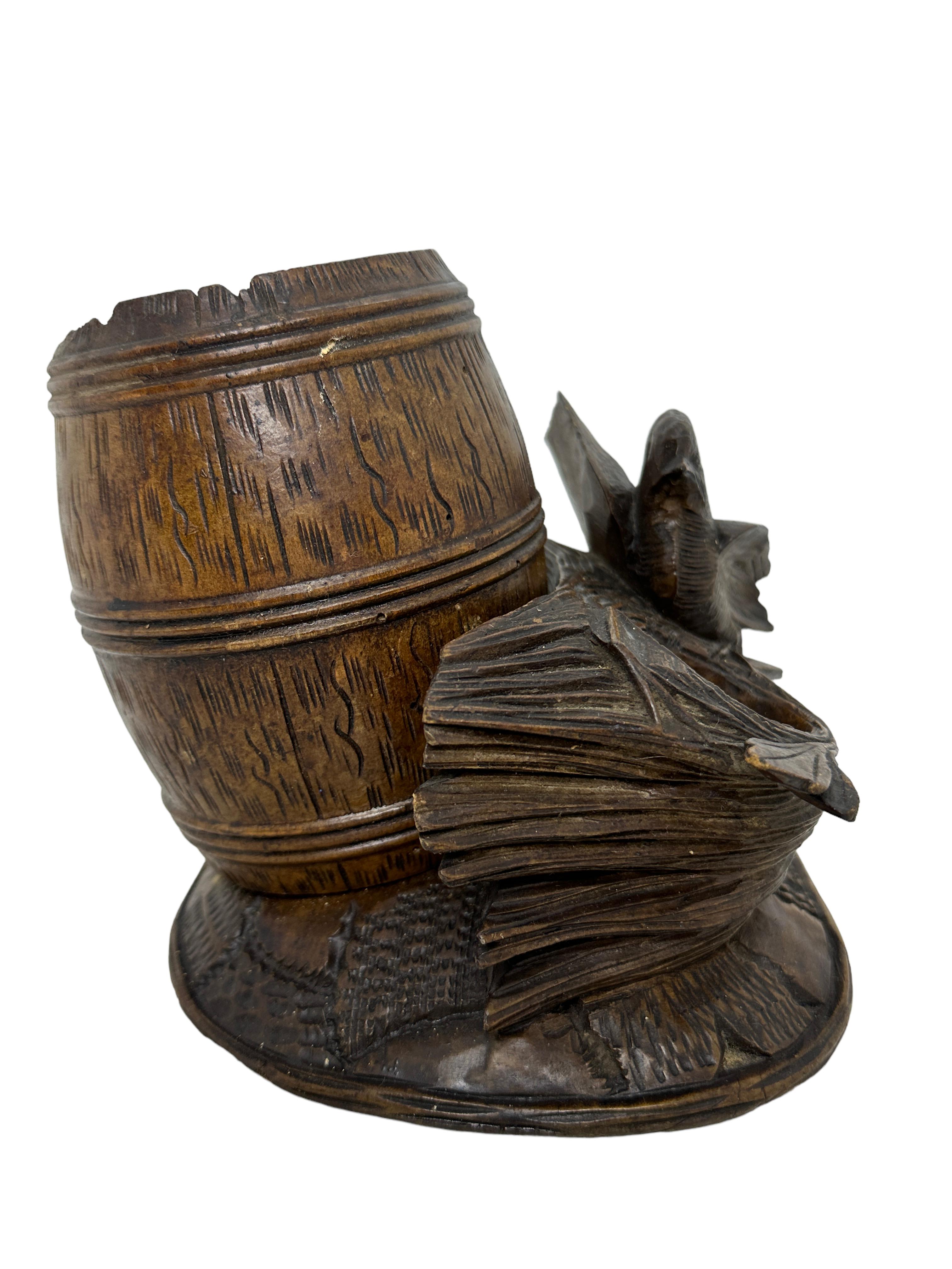 Classic 1890s black forest Brienz wood carved desktop accessory in form of a Barrel with a Bird. Nice addition to your room or just for use it on your desk. Made of hand carved wood. Found at an estate sale in Vienna, Austria. The Barrel can hold