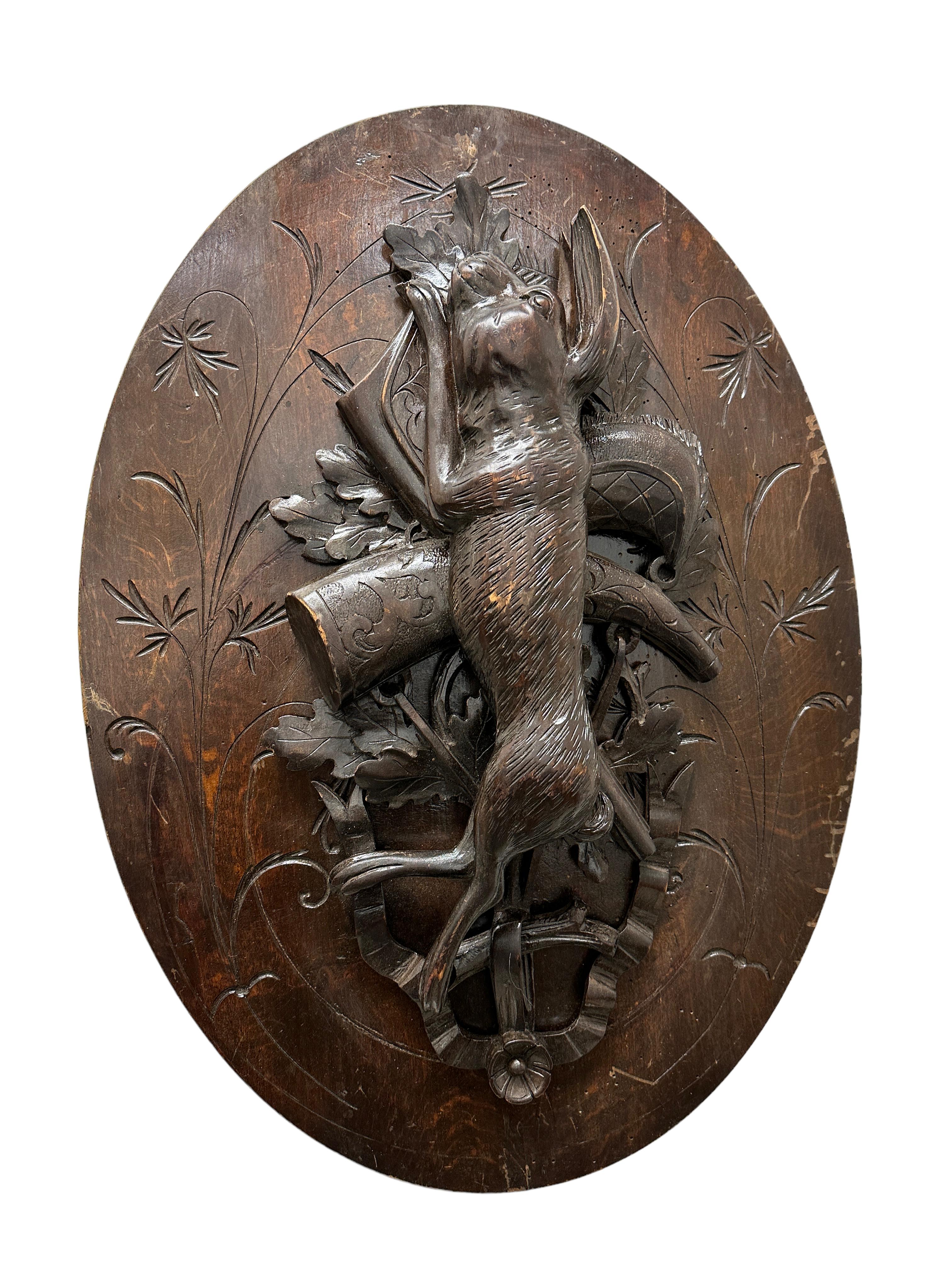 Rare antique large German black forest hunt scene wall plaque trophy depicting a Rabbit and powder Horn.
Wonderful Trophy of the Hunt for your Black Forest Collection. This is a truly fine carved older piece. 
Great lodge or ski cabin decorative