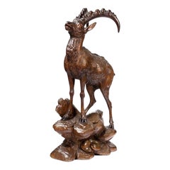 Scultura in legno di Black Forest raffigurante uno stambecco