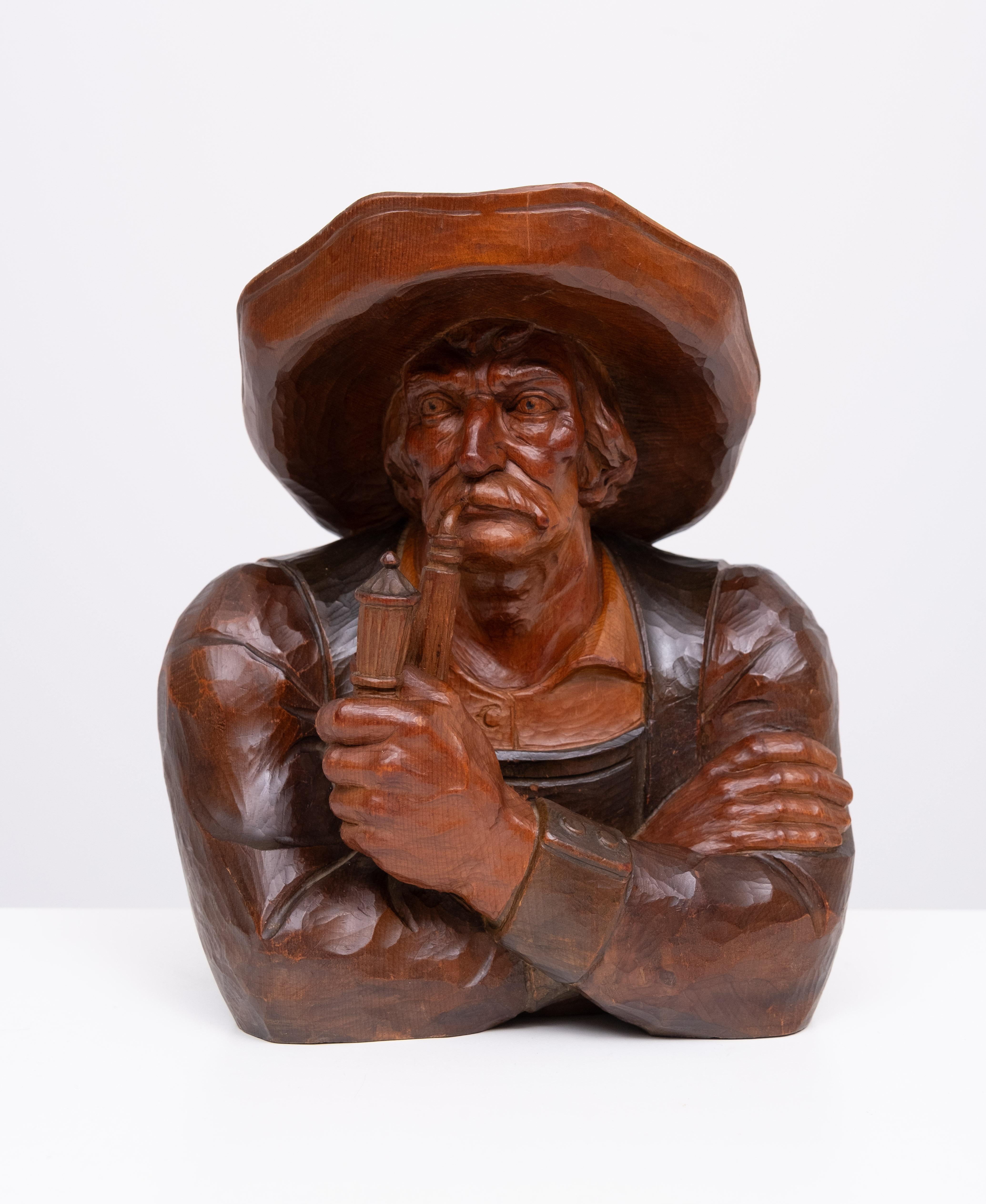 Beautiful handmade Black Forest Woodcarving . Tiroler men with Pipe .
Very nice quality carving . signed with a monogram M O . and underneath 
the place where it was made . and dated 1923 