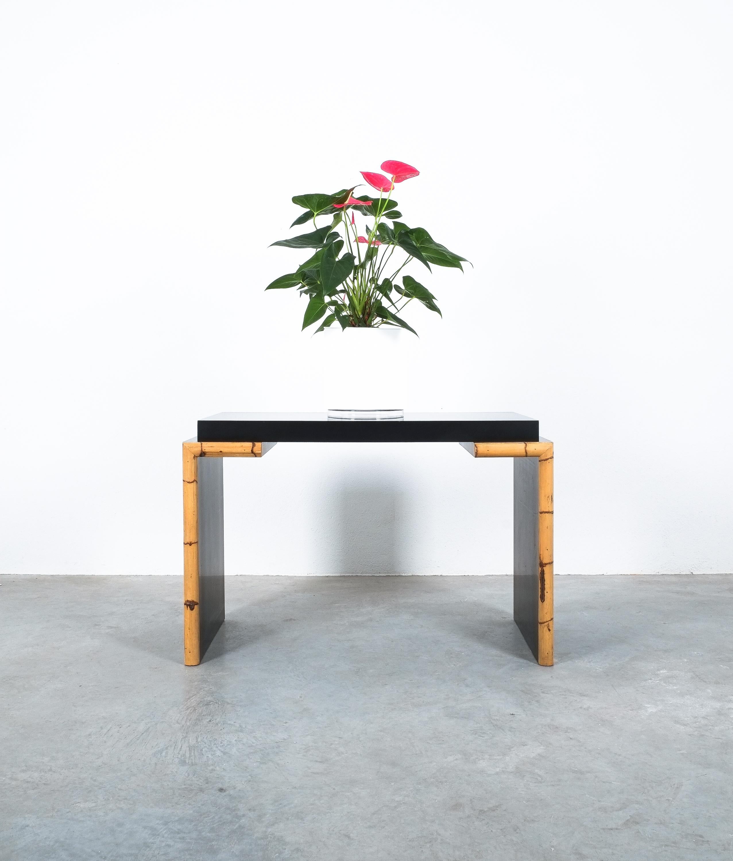 Black Formica bamboo desk, Italy, circa 1985

A Postmodern small table perfect and stylish for any daily accomplishments. Comprised of Formica on wood with bamboo decor this desk certainly was greatly inspired by radical design approached from the