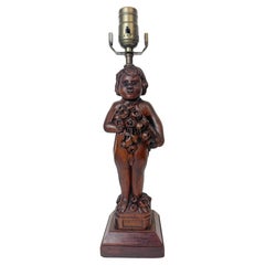 Vintage Black Forrest Art Deco Carved Cherub Presenting Bouquet of Flowers Lamp, C.1925