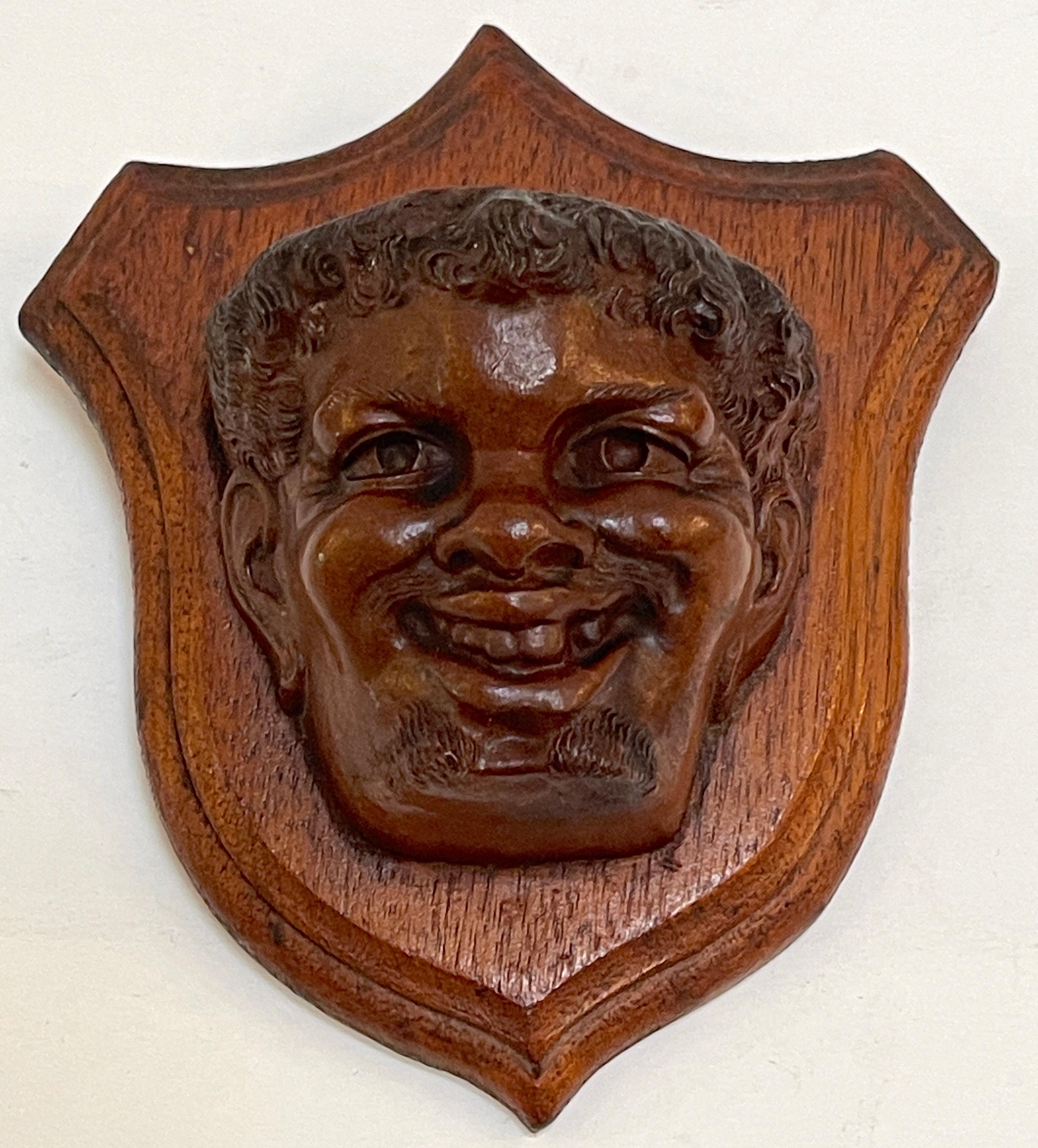 19th Century Black Forrest Carved Black Walnut Toothless Man Motif Hanging Match Holder For Sale