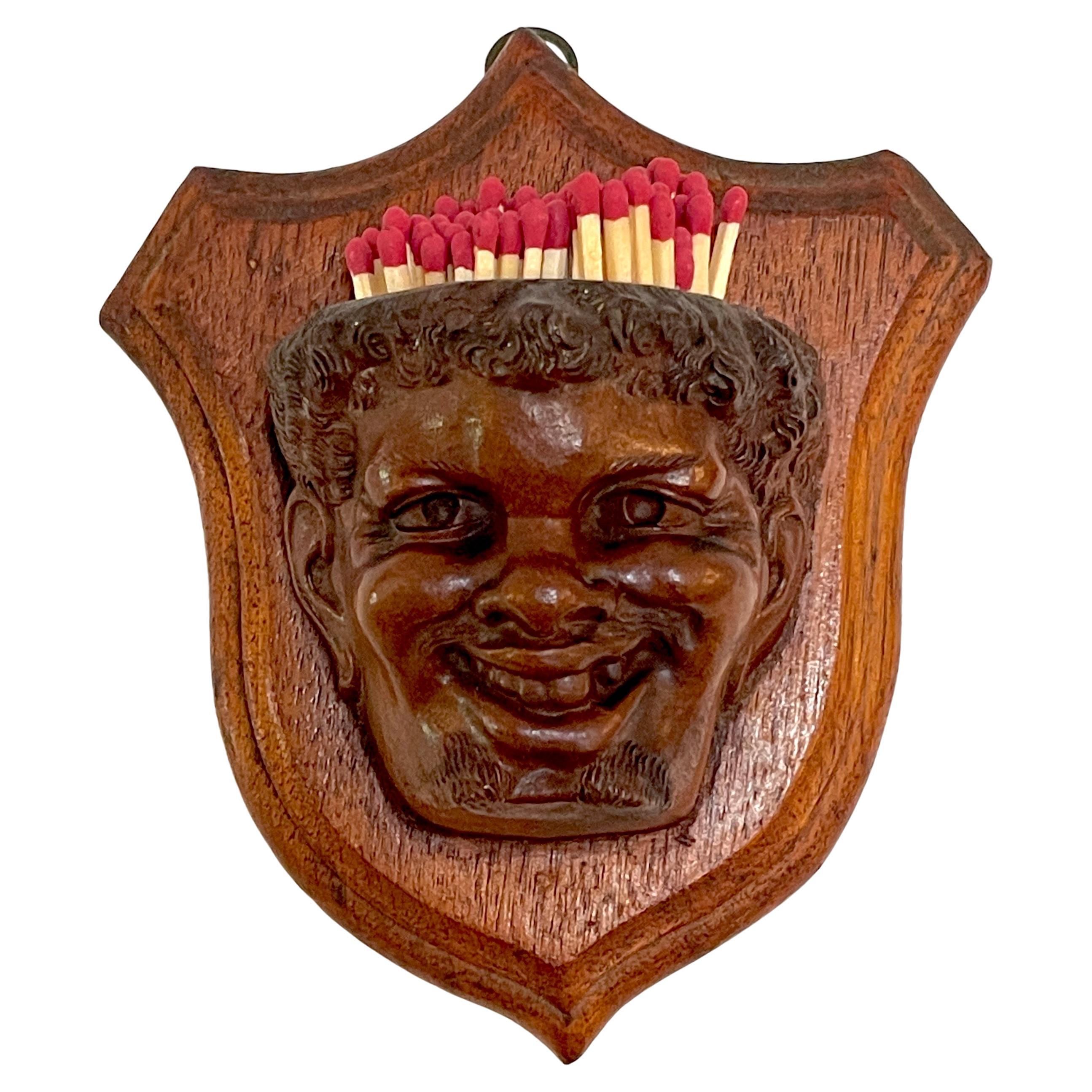 Black Forrest Carved Black Walnut Toothless Man Motif Hanging Match Holder For Sale