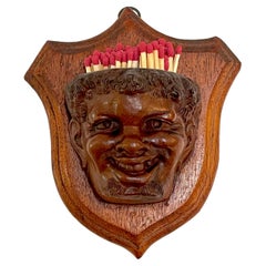 Antique Black Forrest Carved Black Walnut Toothless Man Motif Hanging Match Holder
