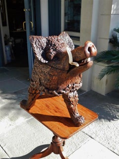 Black Forrest Carved Oak Hinged Boar Head Cellarette with Bone Tusk, C. 1870