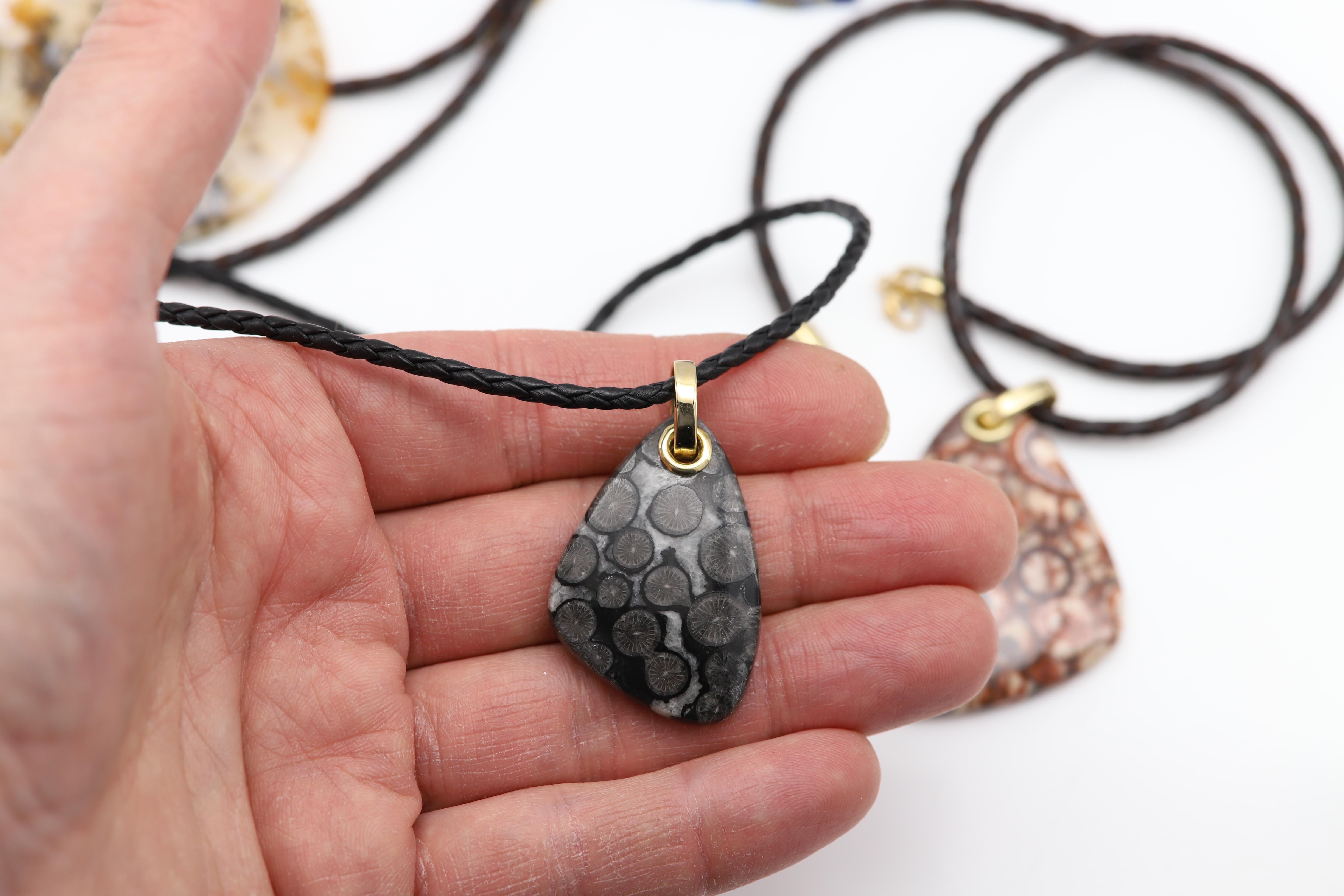 Tumbled Black Fossil Coral stone Necklace Natural Stone Pendant 14 Karat Yellow Gold For Sale