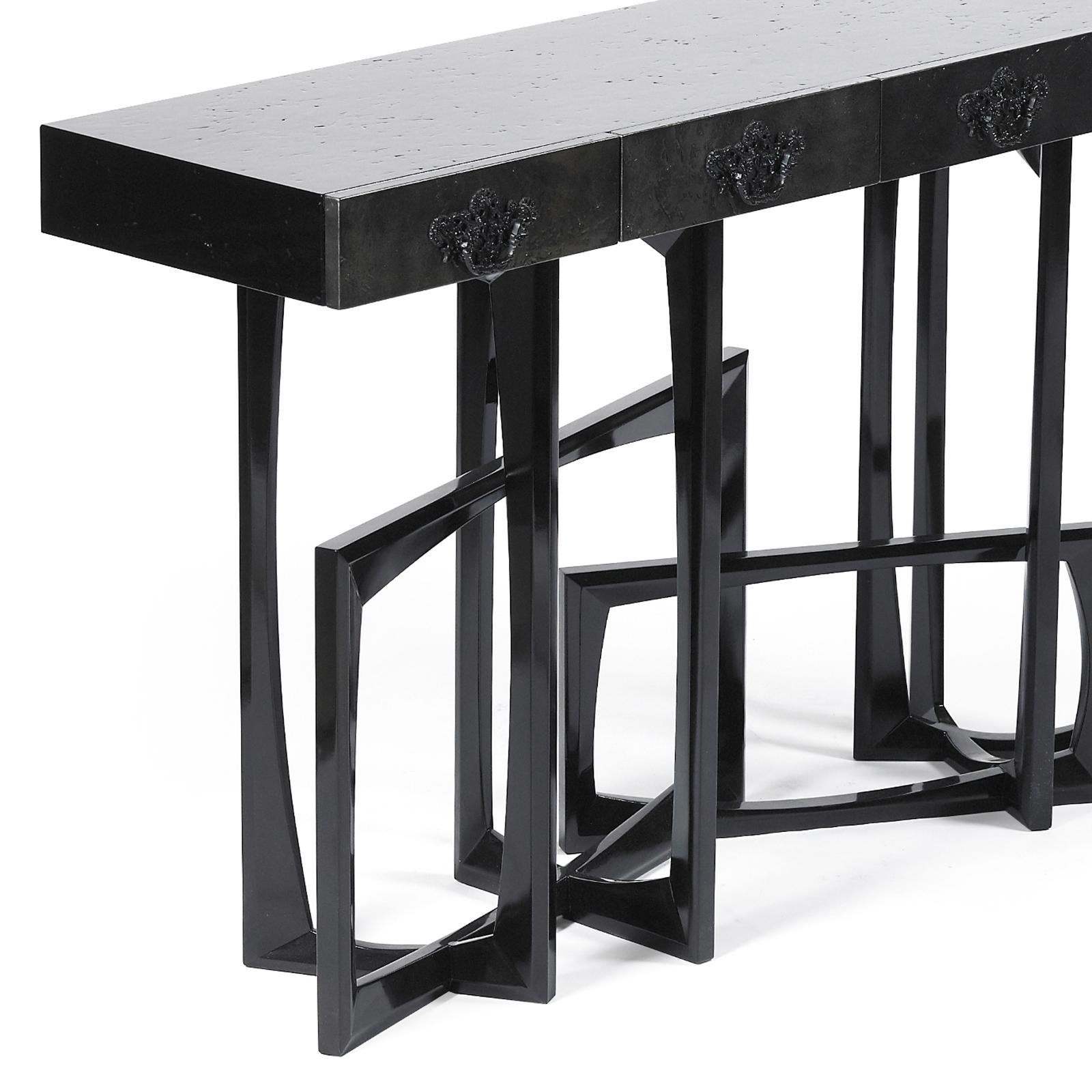 Console table black frame with solid mahogany structure
hand painted with black lacquered paint. Base in black
lacquered paint. Exceptional piece.
Available in gold leaf finish.