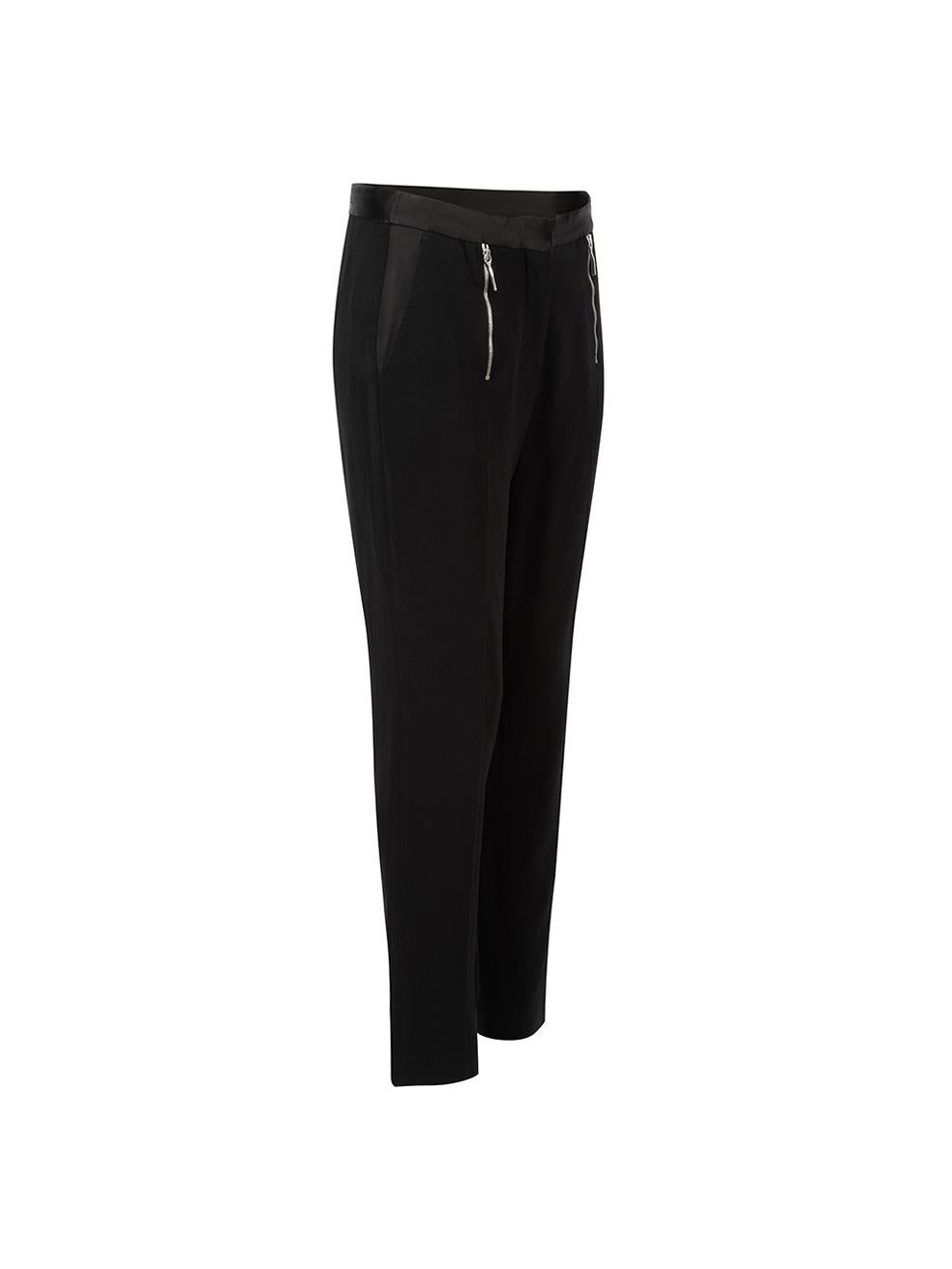 CONDITION is Good. Minor wear to trousers is evident. Light wear to waistband fabric at centre back on this used Costume National designer resale item.



Details


Black

Synthetic

Trousers

Slim fit

Mid rise

Satin waistband

2x Zip front