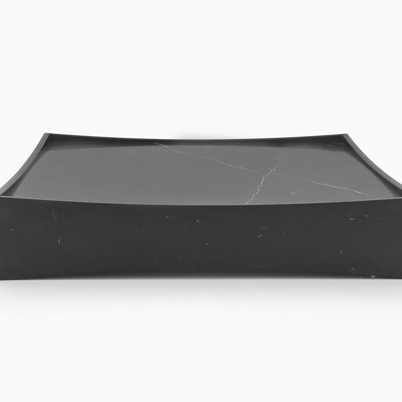 Low table, square, in black Marquina marble, matt polished finish also available in white Carrara marble, matt polished finish.
  