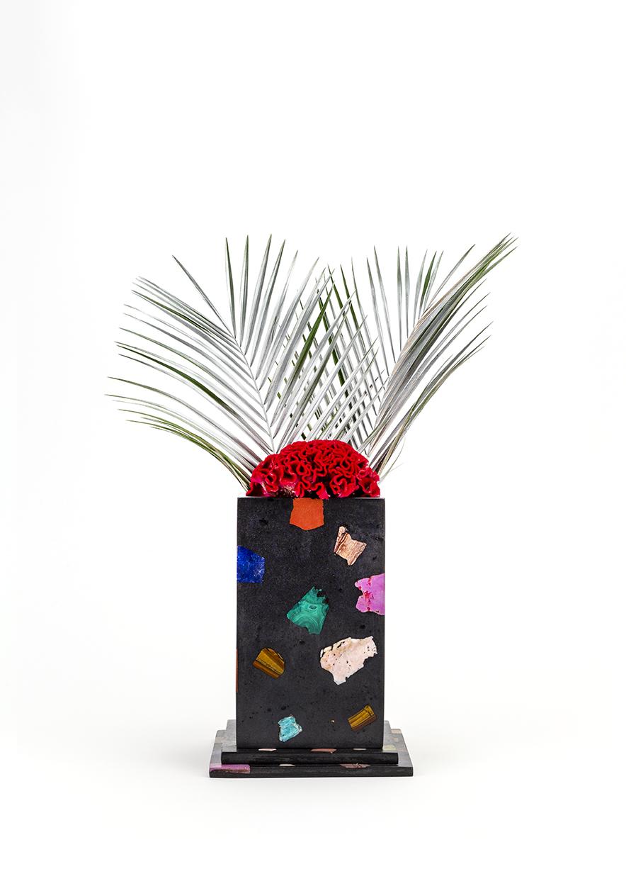 An architectural element for your floral arrangement, Deep Field is a jet black colorway featuring Lapis, Rhodochrosite, Phosphosiderite, Goldstone, Agate, and other brightly colored stones. Each vase is cast in our proprietary gemstone terrazzo