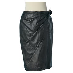Black genuine leather wrapped skirt with gold metal buckle on the side SIENA
