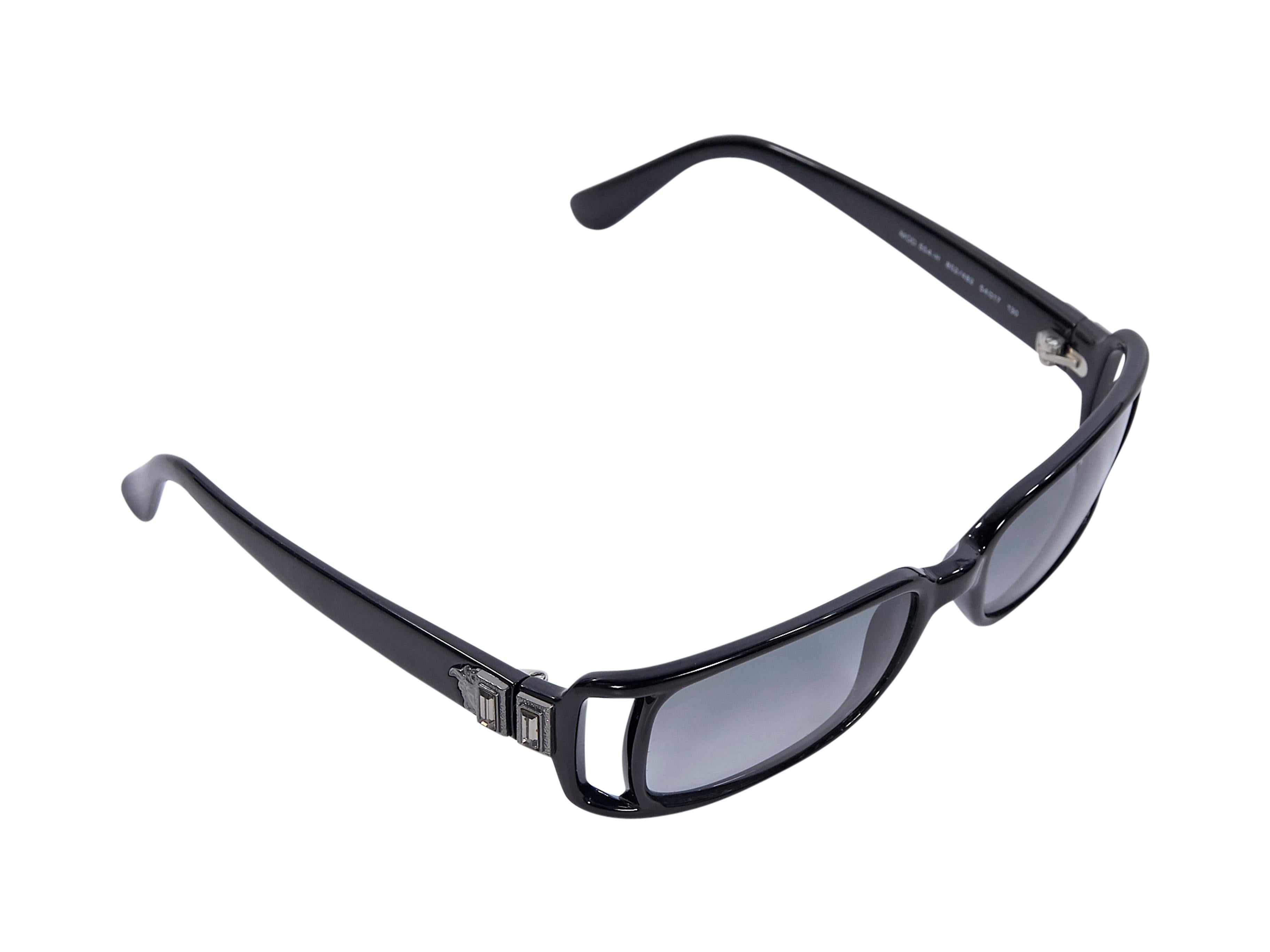 Product details:  Black rectangular sunglasses by Gianni Versace.  Vented temples.  Gunmetal-tone hardware.  1.75