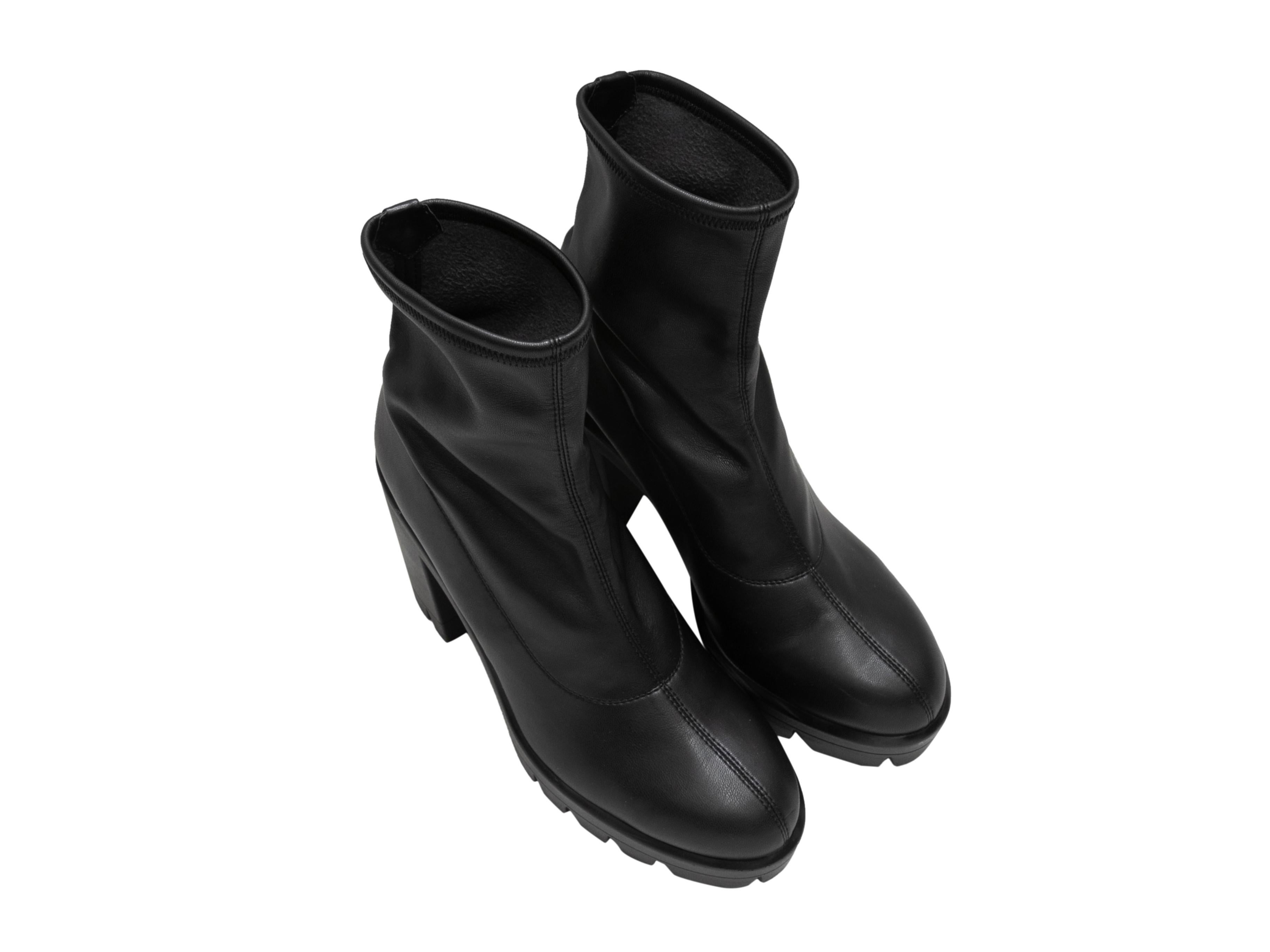 Black leather chunky ankle sock boots by Giuseppe Zanotti. Lug soles. 6.25