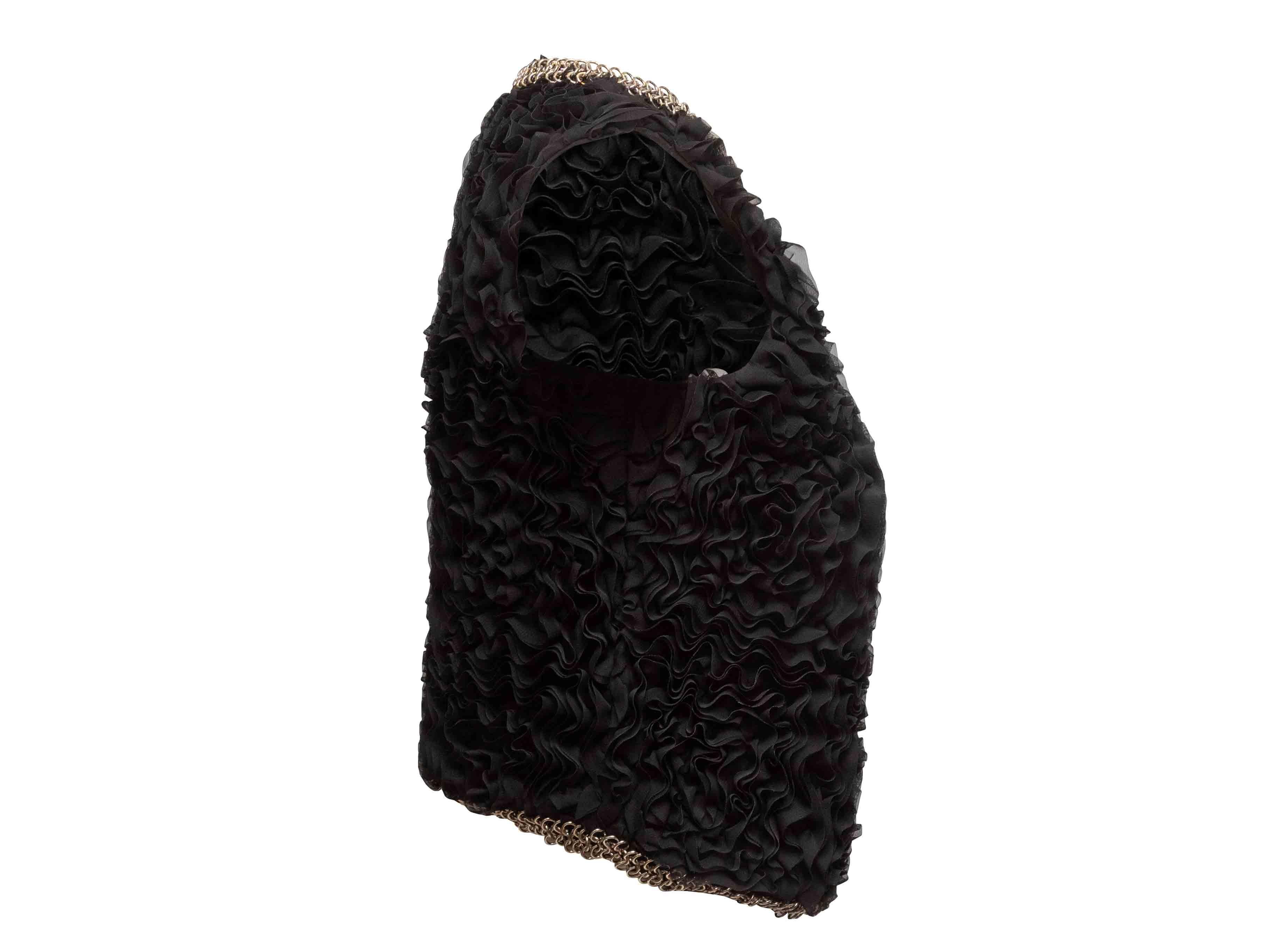 Schwarze, mit Ketten besetzte Rüschenweste von Givenchy. V-Ausschnitt. Vorderer Haken- und Ösenverschluss. 32