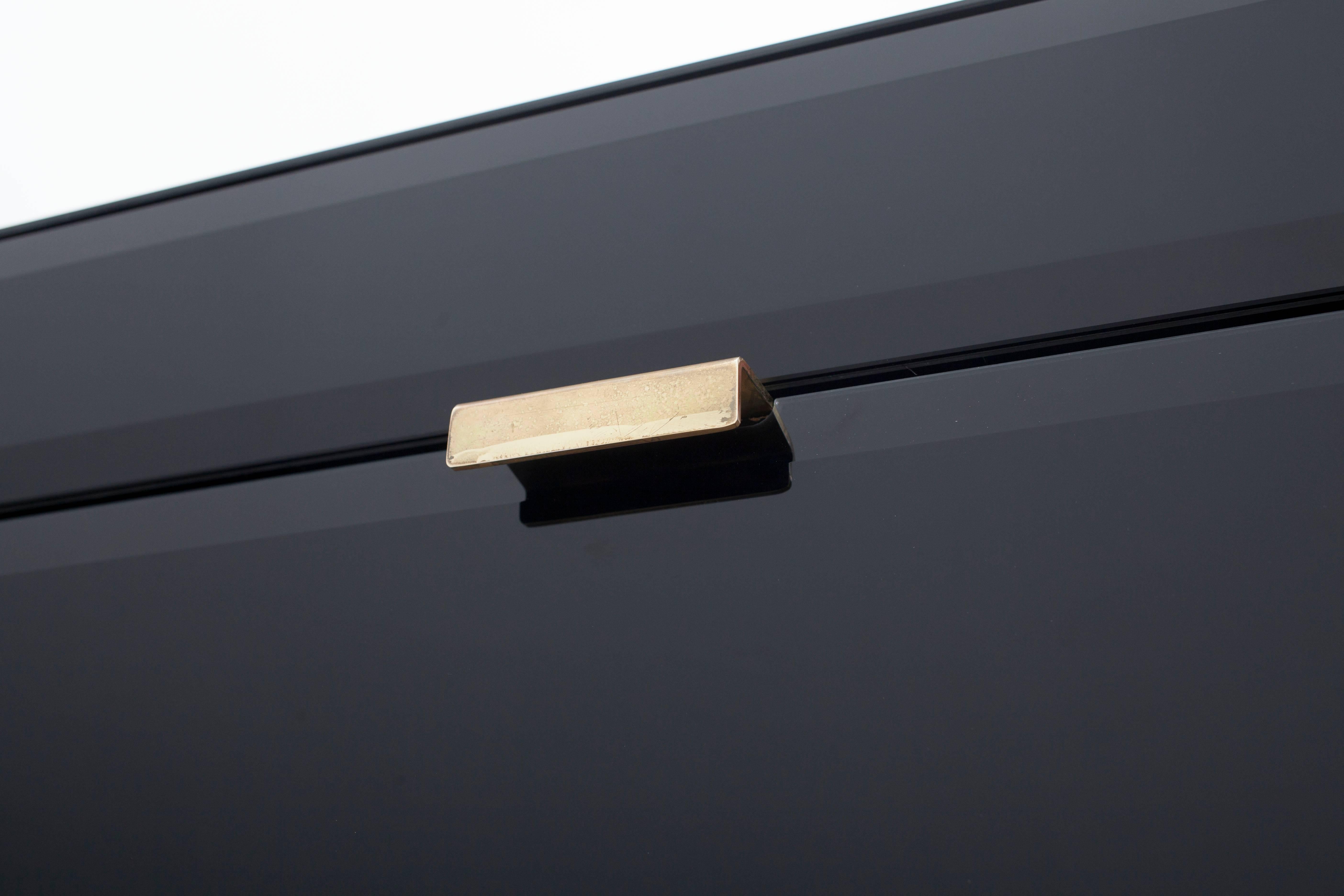 black glass credenza