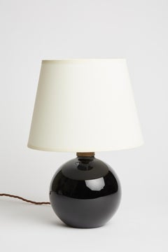 Lampe à poser en verre noir par Jacques Adnet