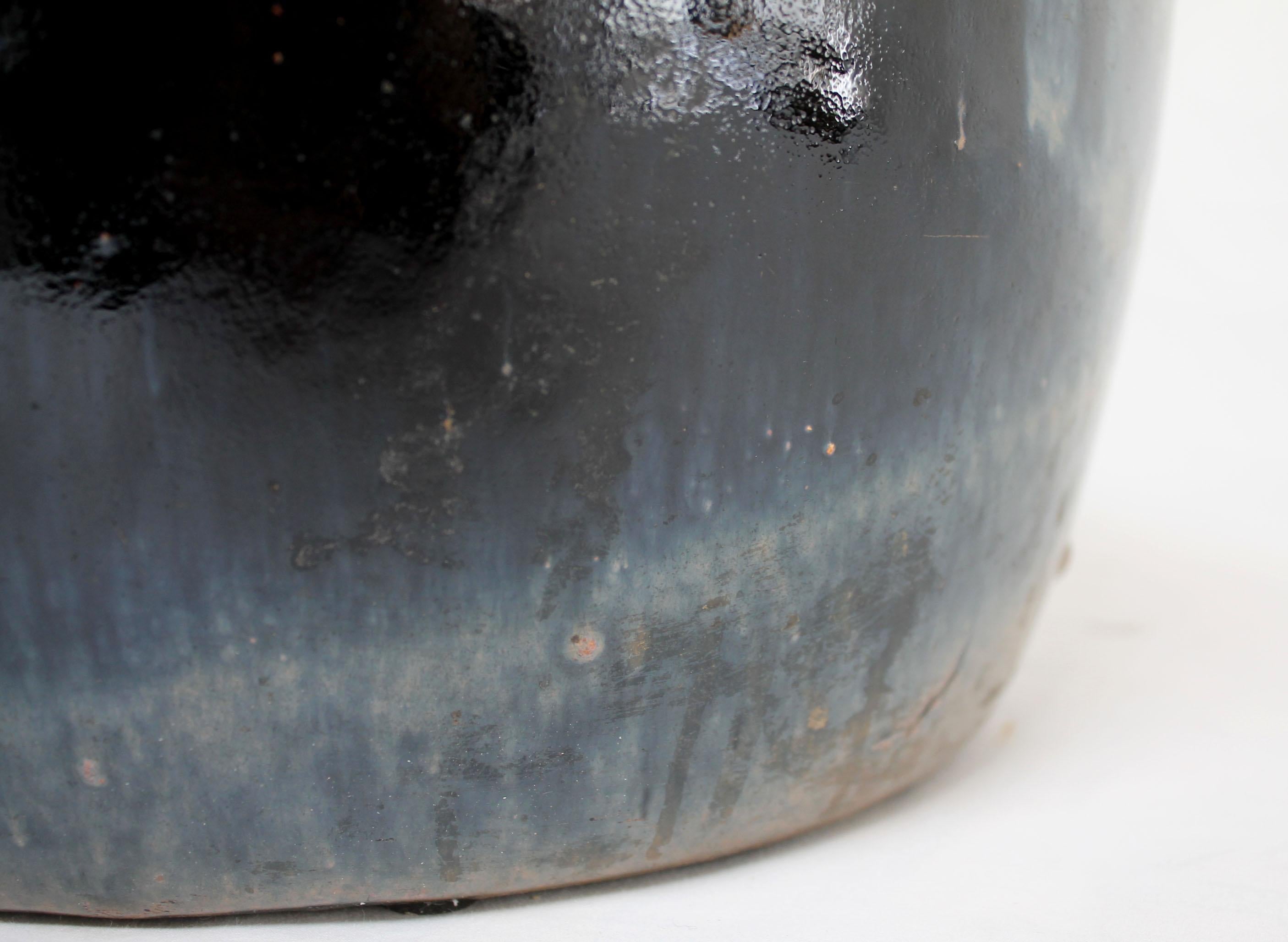 One of a kind black glazed terracotta bowl
Size: 14