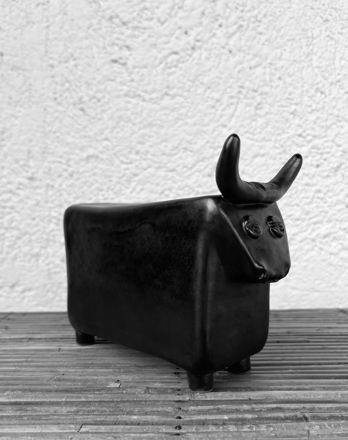 Mid-20th Century black glazed ceramic bull by Cloutier 1960's