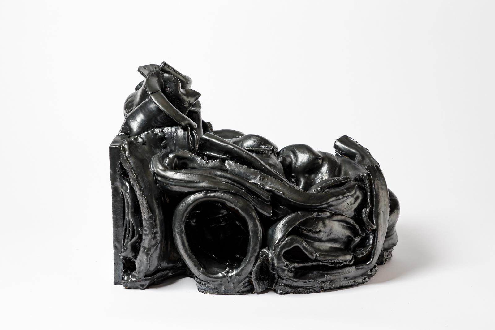 Scultura murale in ceramica smaltata nera di Patrick Crulis.
2024. Pezzo unico.
H. : 19,3 x 15,7 x 15,7 pollici.
Dimensioni approssimative.
