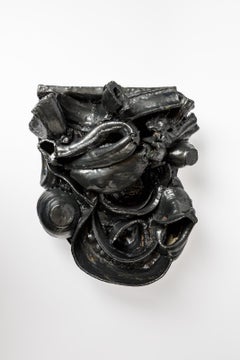 Black glazed ceramic mural sculpture by Patrick Crulis, 2024