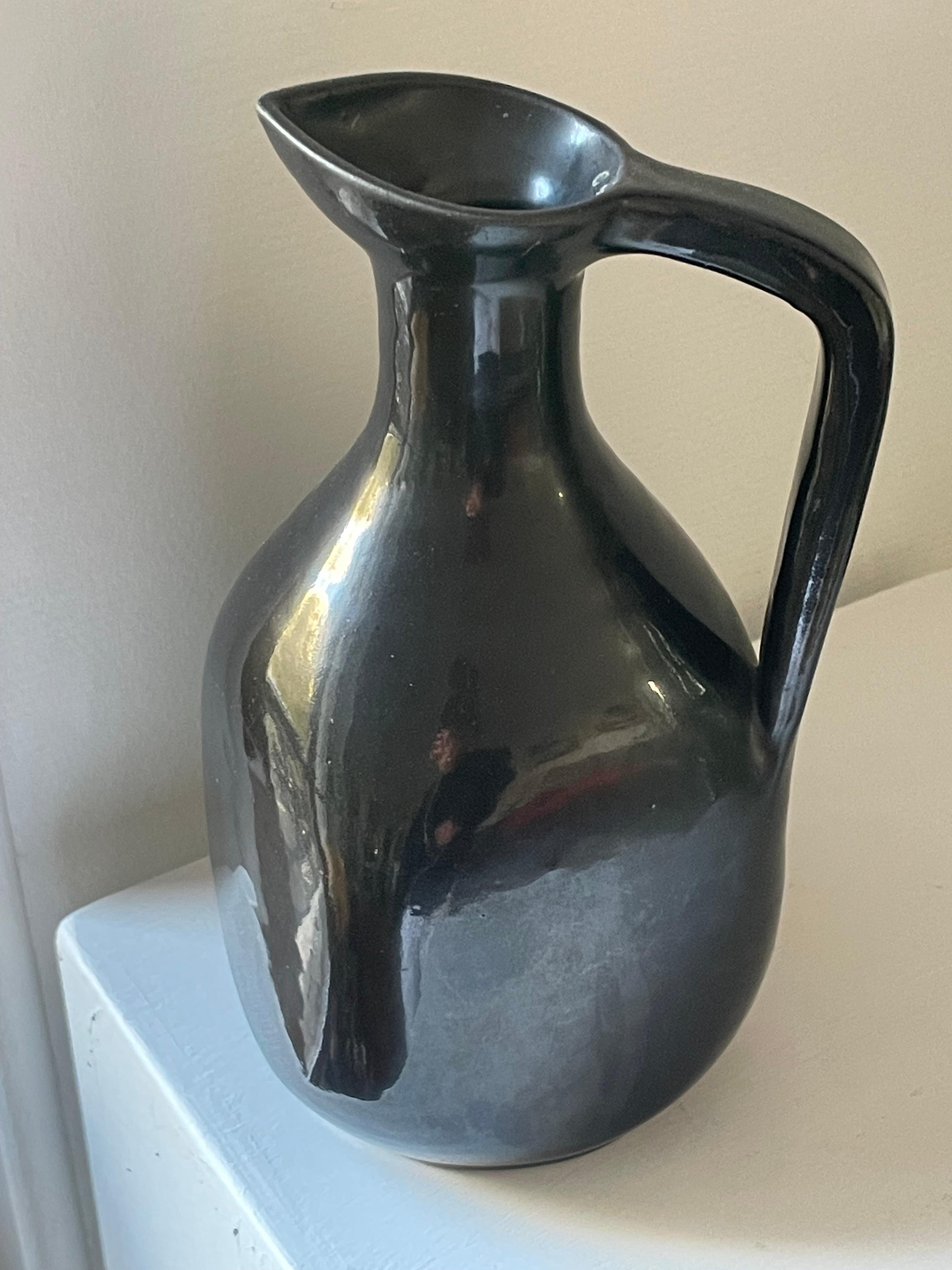 Glazed Black glazed ceramic pitcher by Accolay potters, circa 1950 For Sale