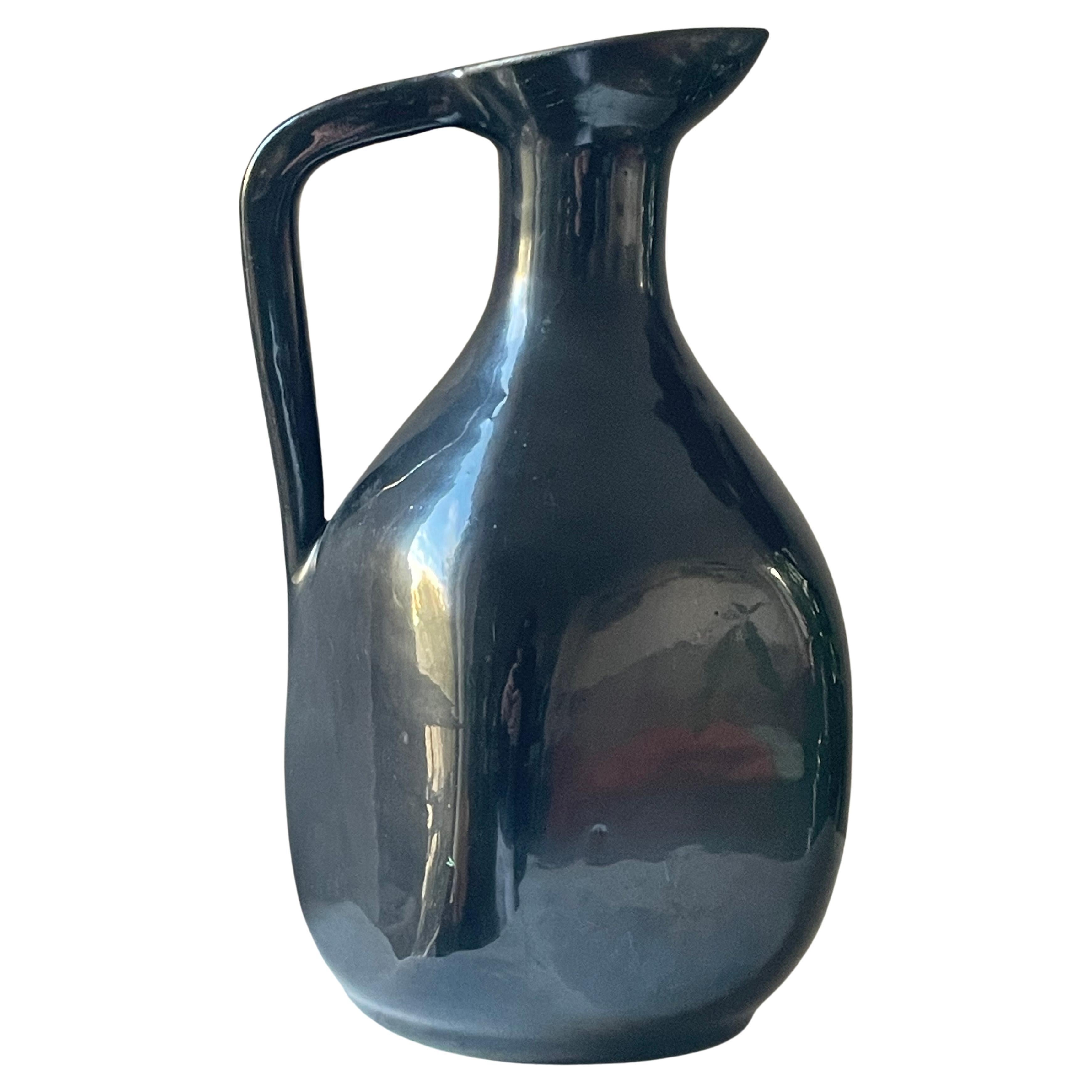 Black glazed ceramic pitcher by Accolay potters, circa 1950 For Sale