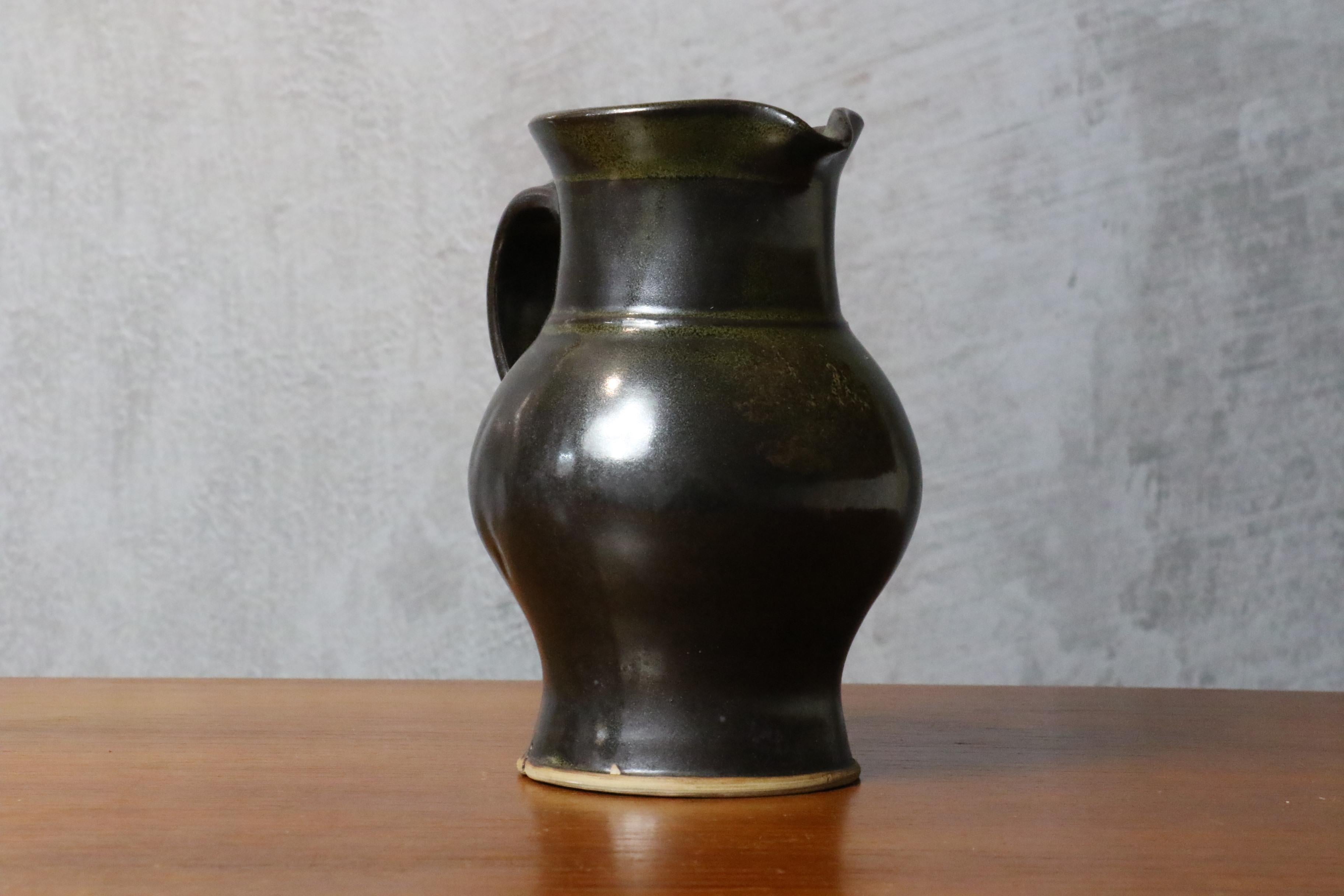 Black Glazed Ceramic Pitcher with Green Glints by Jean Girel, French Ceramist In Good Condition For Sale In Camblanes et Meynac, FR