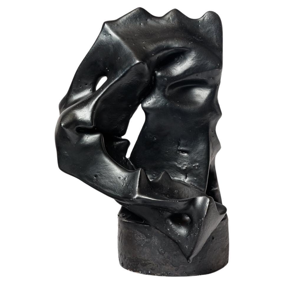Black glazed ceramic sculpture by Michel Lanos, circa 1990