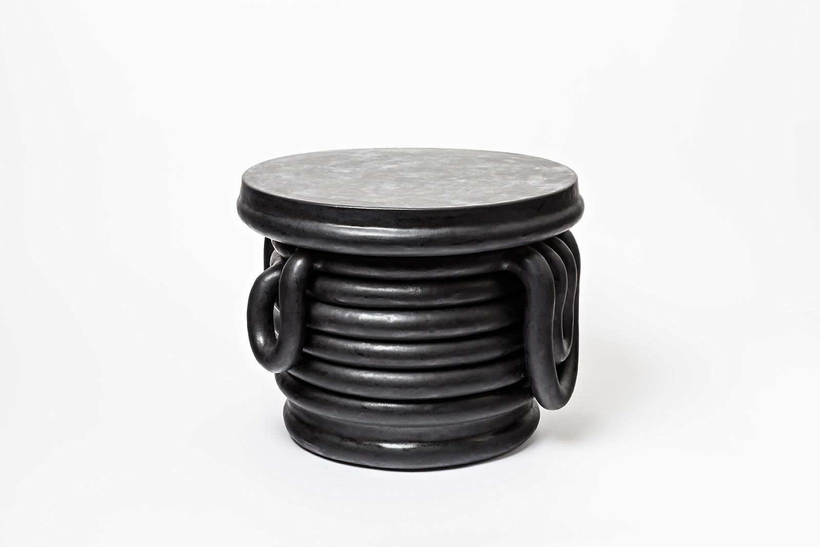 Black glazed stoneware bedside tables by Clémentine Dupré.
Artist signature under the base. 2021. 
This piece is in two parts.
H : 34 x 45 cm / 13’4 x 17'7 inches.
A pair is available.